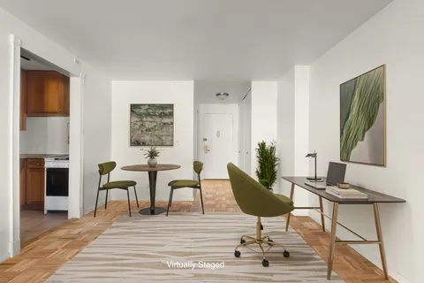 a workspace with furniture and wooden floor