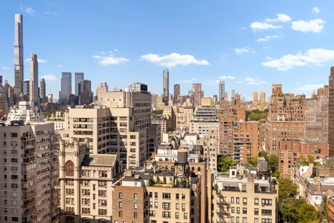 a view of a city with tall buildings