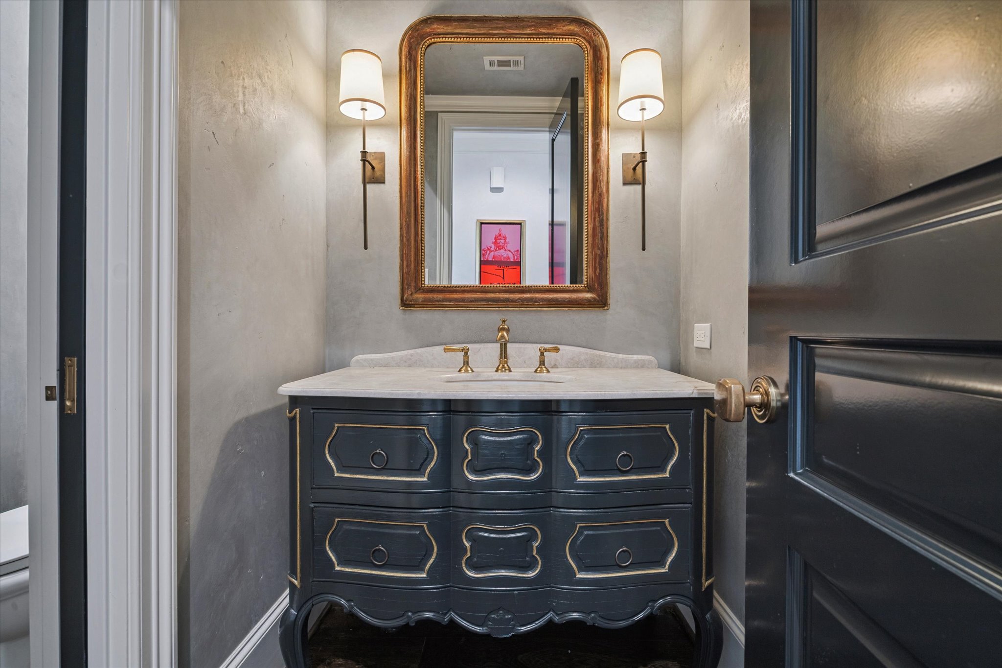 310 Longwoods Lane Houston, TX 77024 - Photo 25 of 49 a view of a sink and a mirror