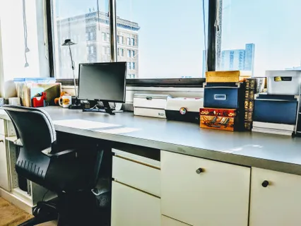 a kitchen with stainless steel appliances a stove a sink and a refrigerator