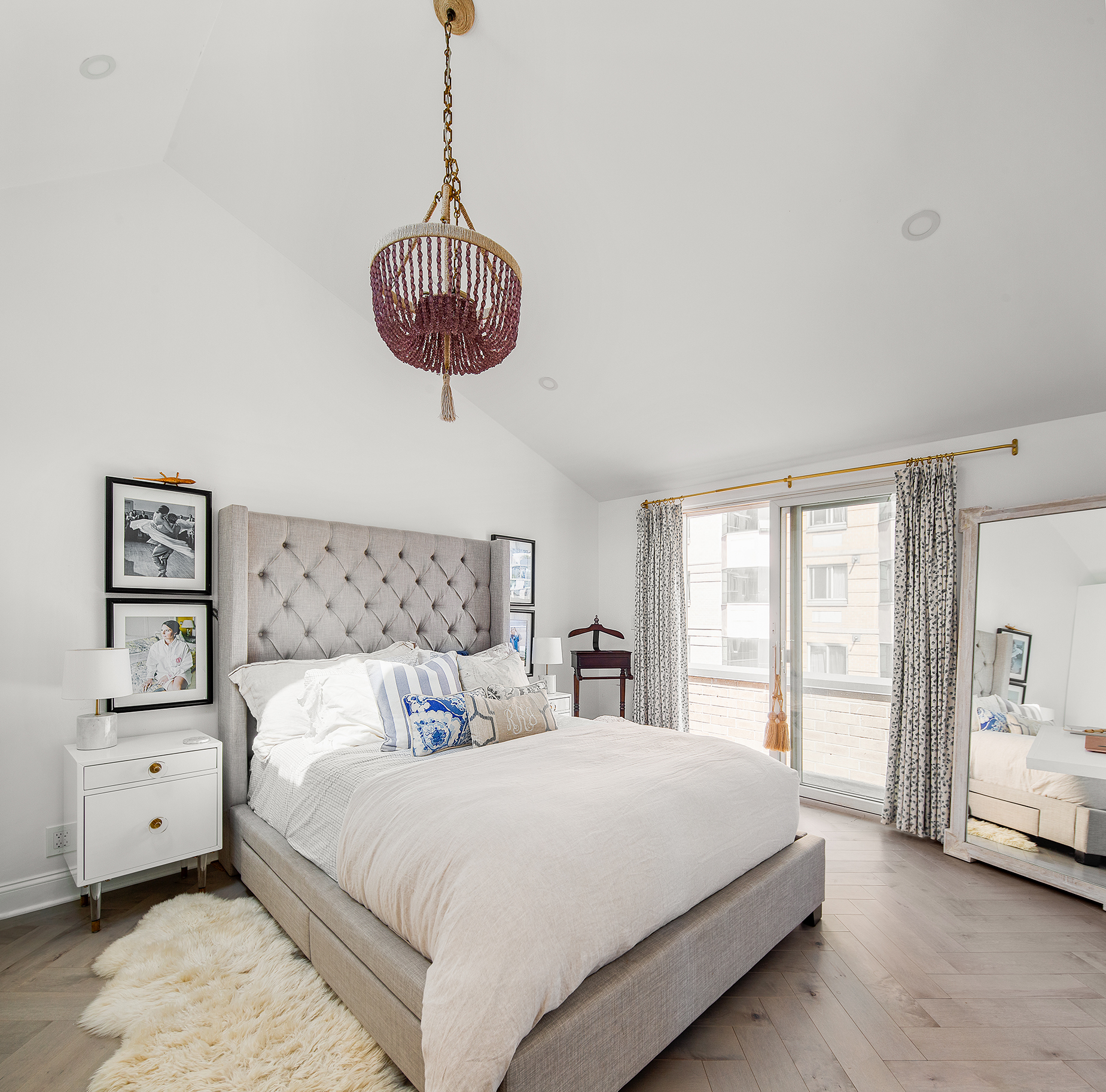 529 West 42nd Street, Unit 9R Manhattan, NY 10036 - Photo 6 of 10 a bedroom with a large bed and a window