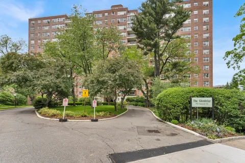 front view of a house with a street
