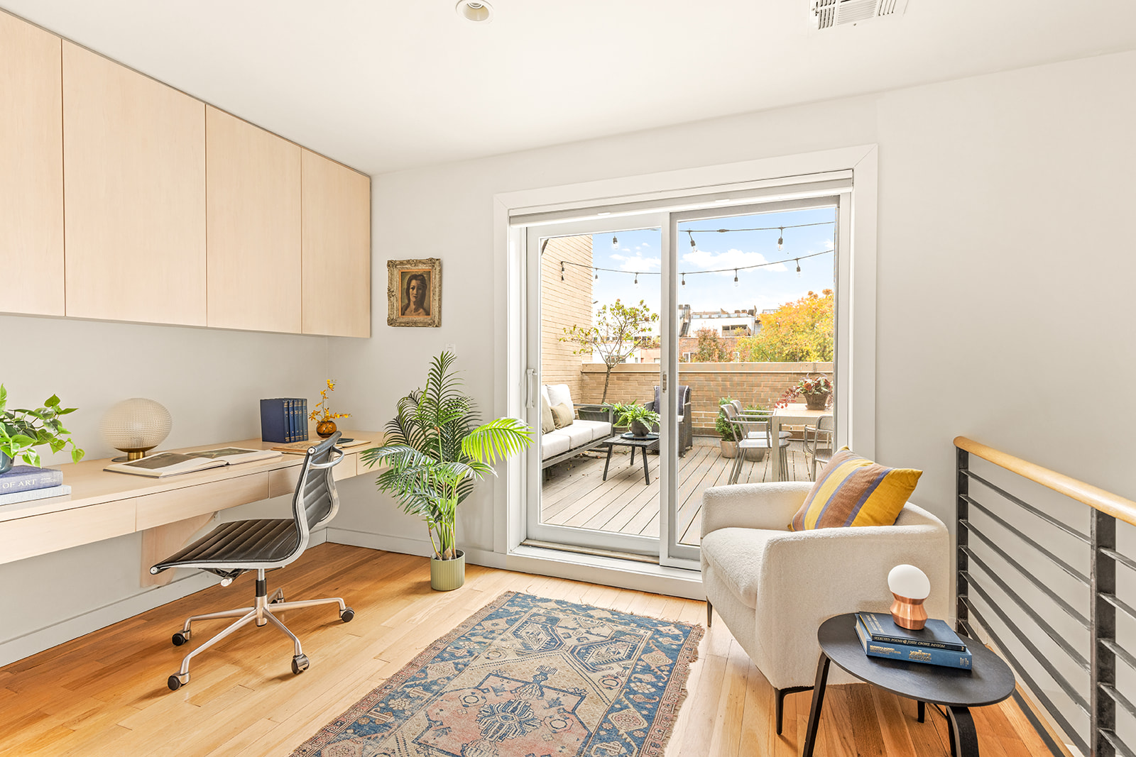323 Greene Avenue, Unit 4A Brooklyn, NY 11238 - Photo 9 of 14 a view of a workspace with furniture and a window
