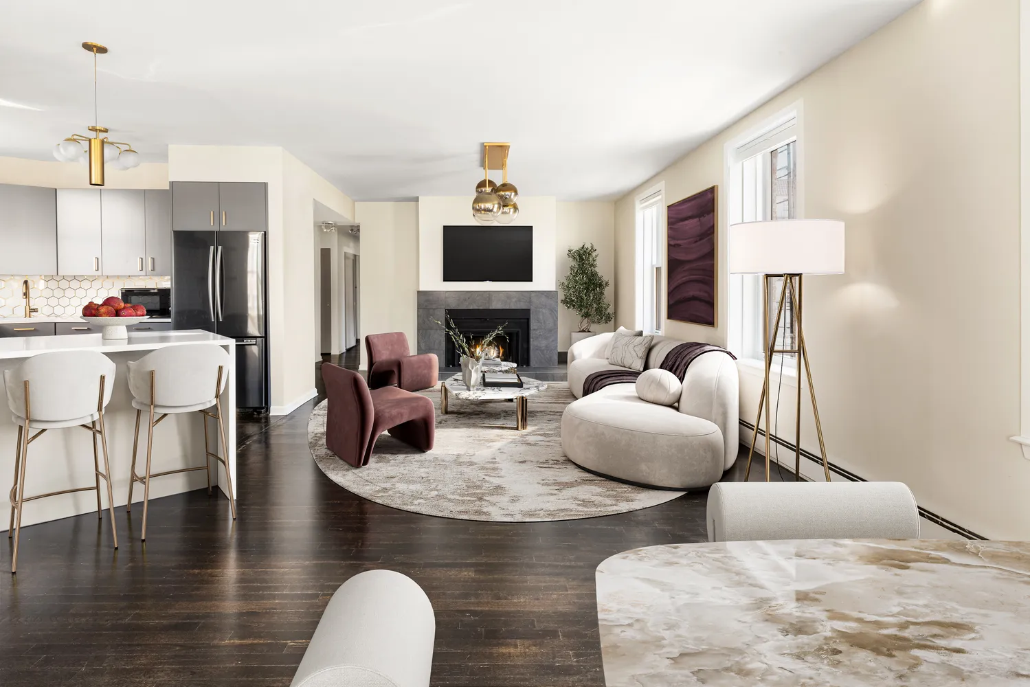 a living room with furniture and a fireplace