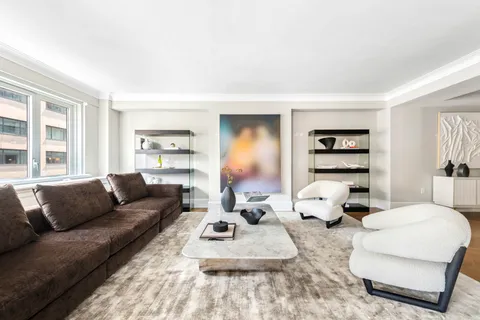 a living room with furniture or couch and a window
