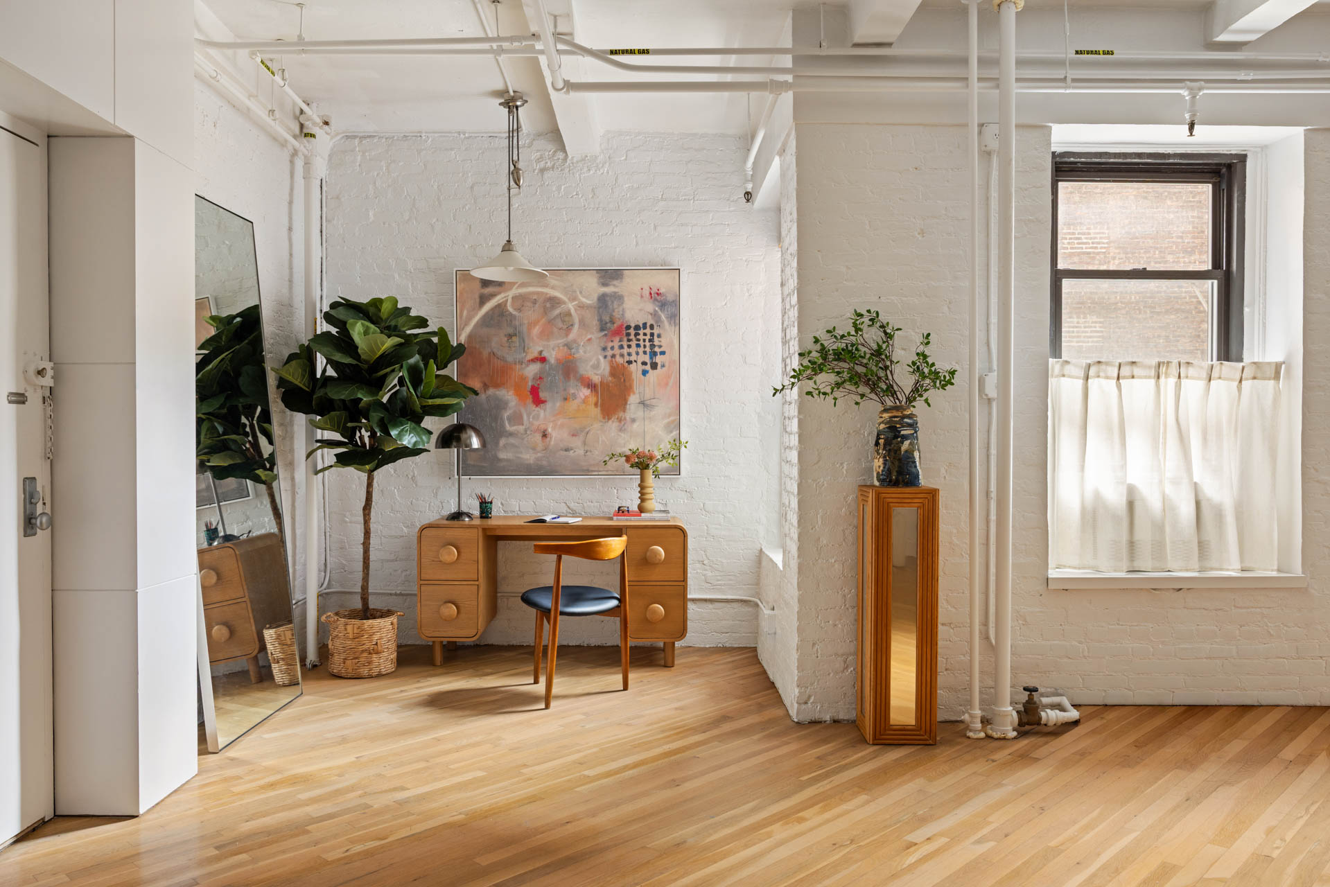 130 West 17th Street, Unit 5S Manhattan, NY 10011 - Photo 4 of 17 a view of a entryway with furniture and floor to ceiling window
