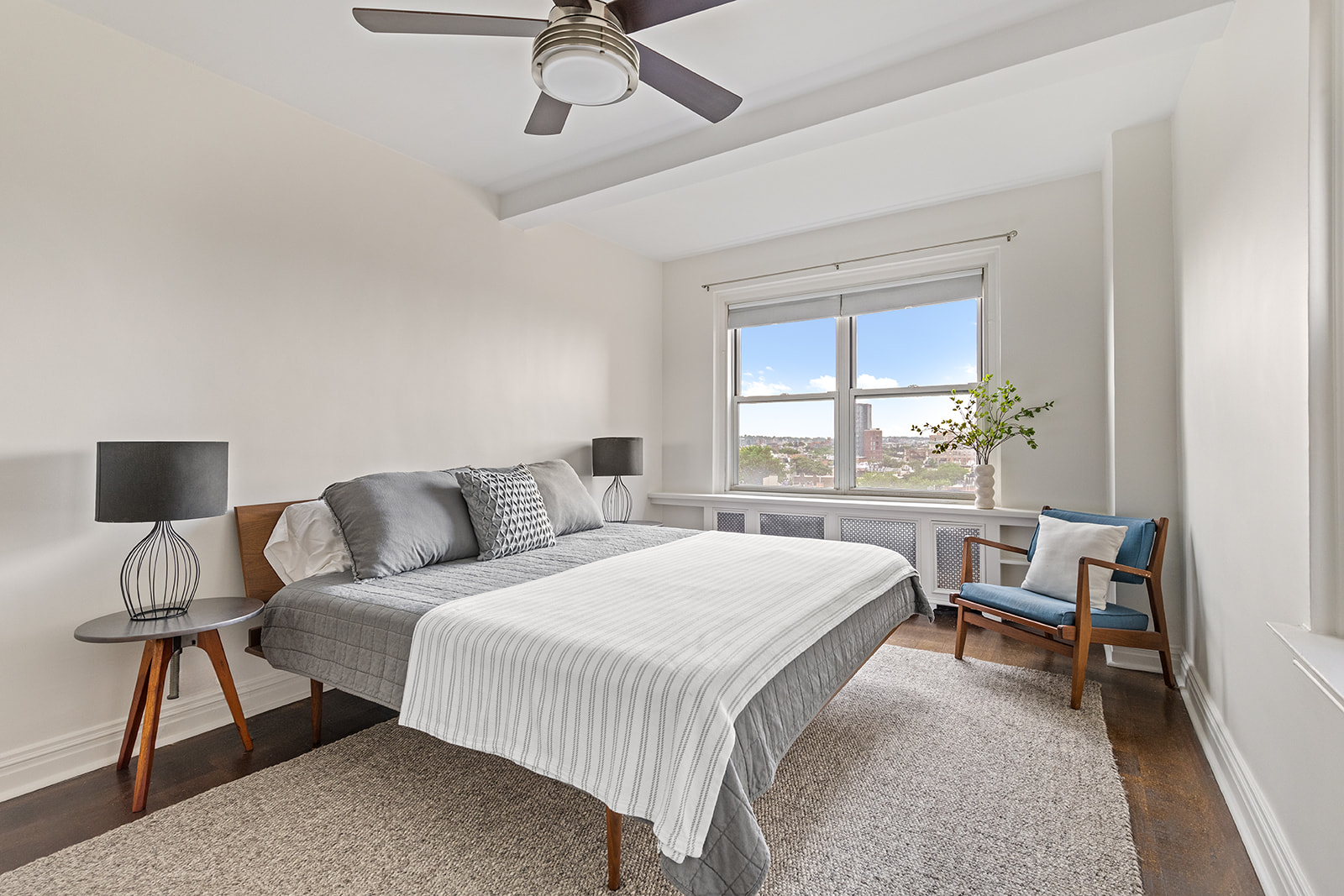 70 Remsen Street, Unit 8F Brooklyn, NY 11201 - Photo 2 of 8 a bedroom with a bed and a window