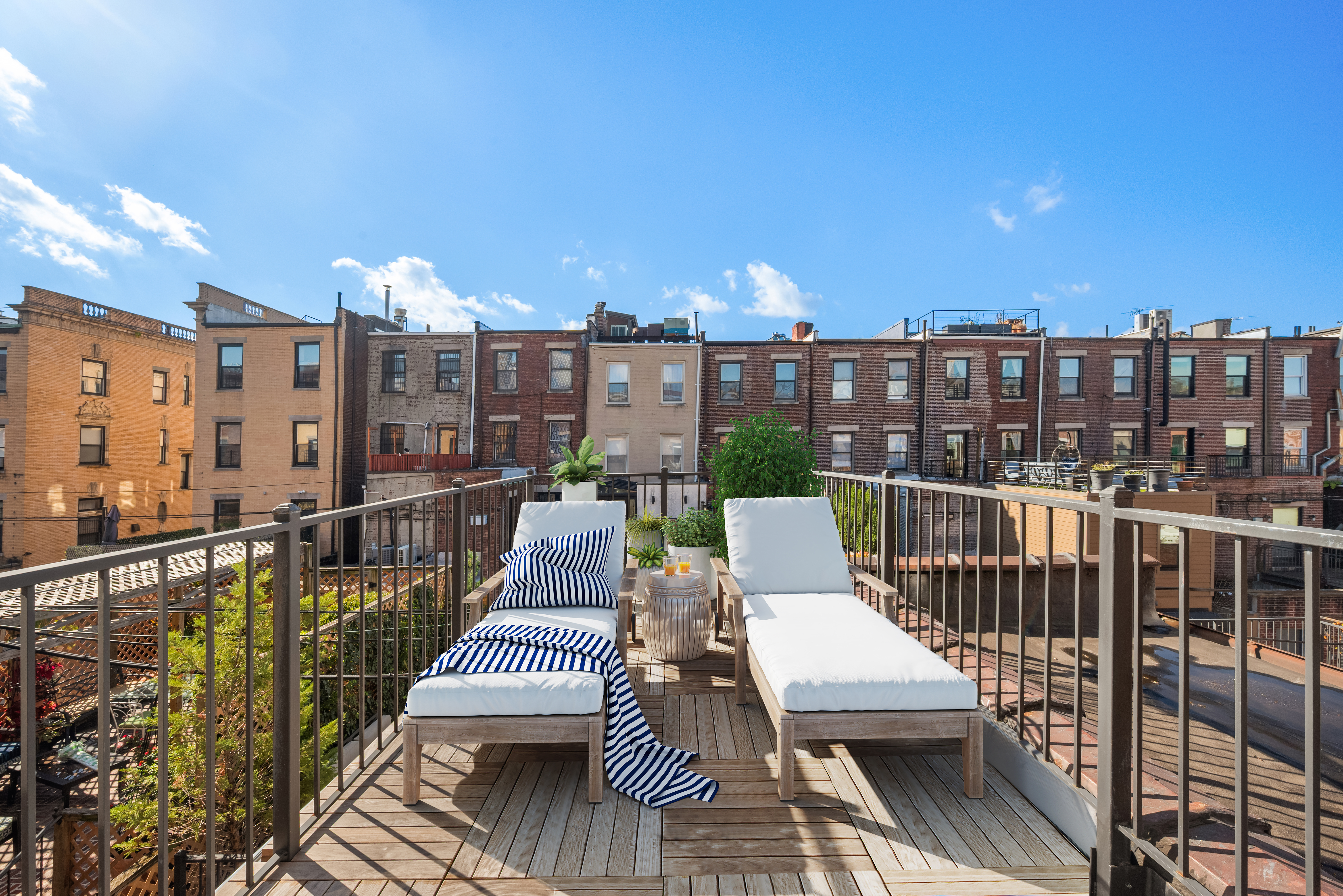 226 West 139th Street Boston, NY 10030 - Photo 10 of 14 a view of a balcony with wooden floor