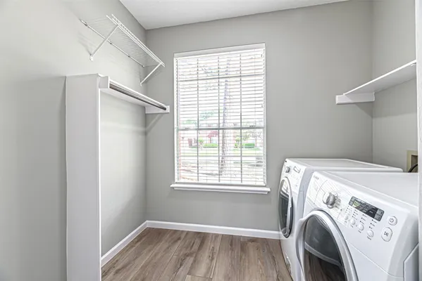 a utility room with dryer and washer