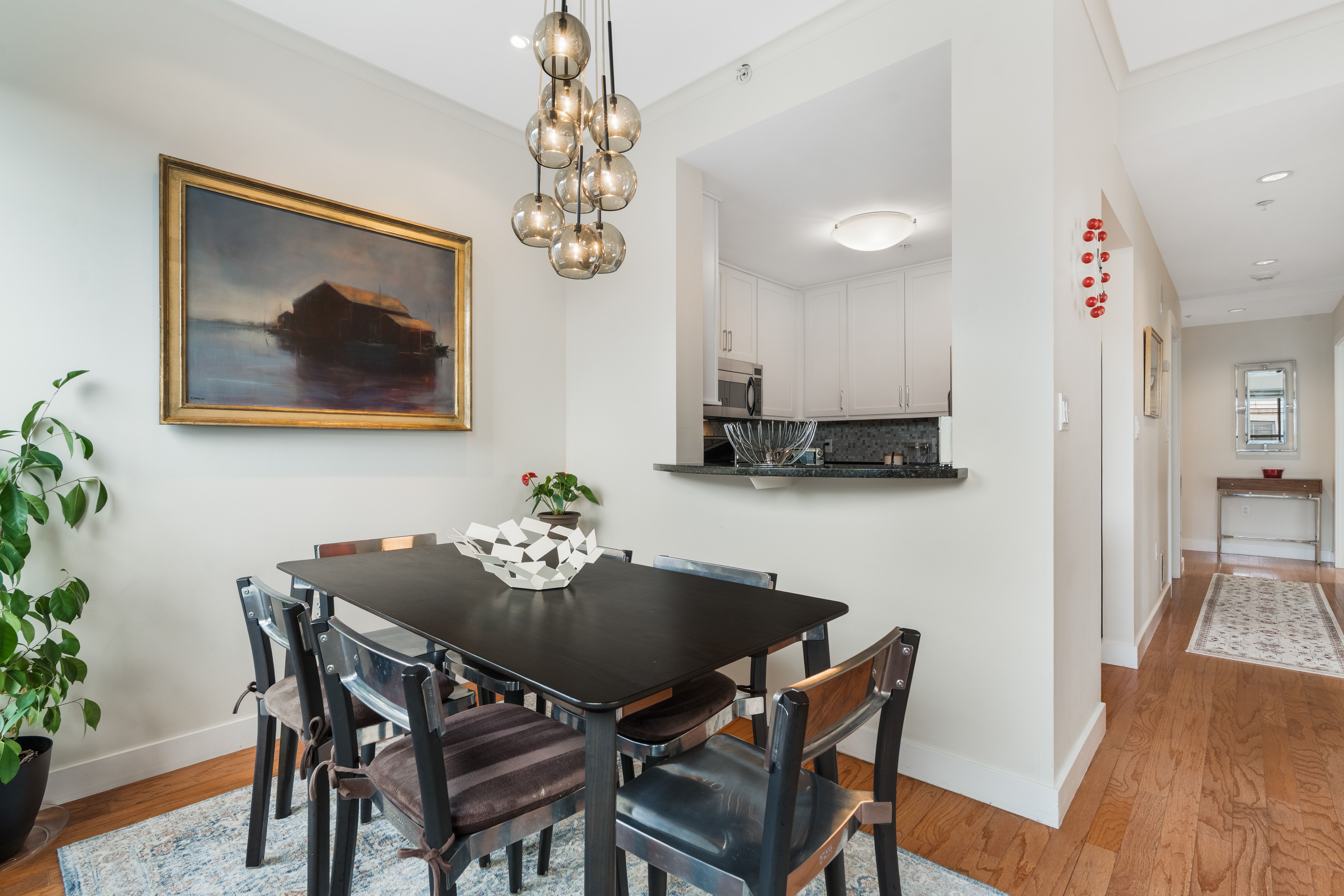 2 Rollins Street, Unit D601 Boston, MA 02118 - Photo 11 of 29 a view of a dining room with furniture and chandelier
