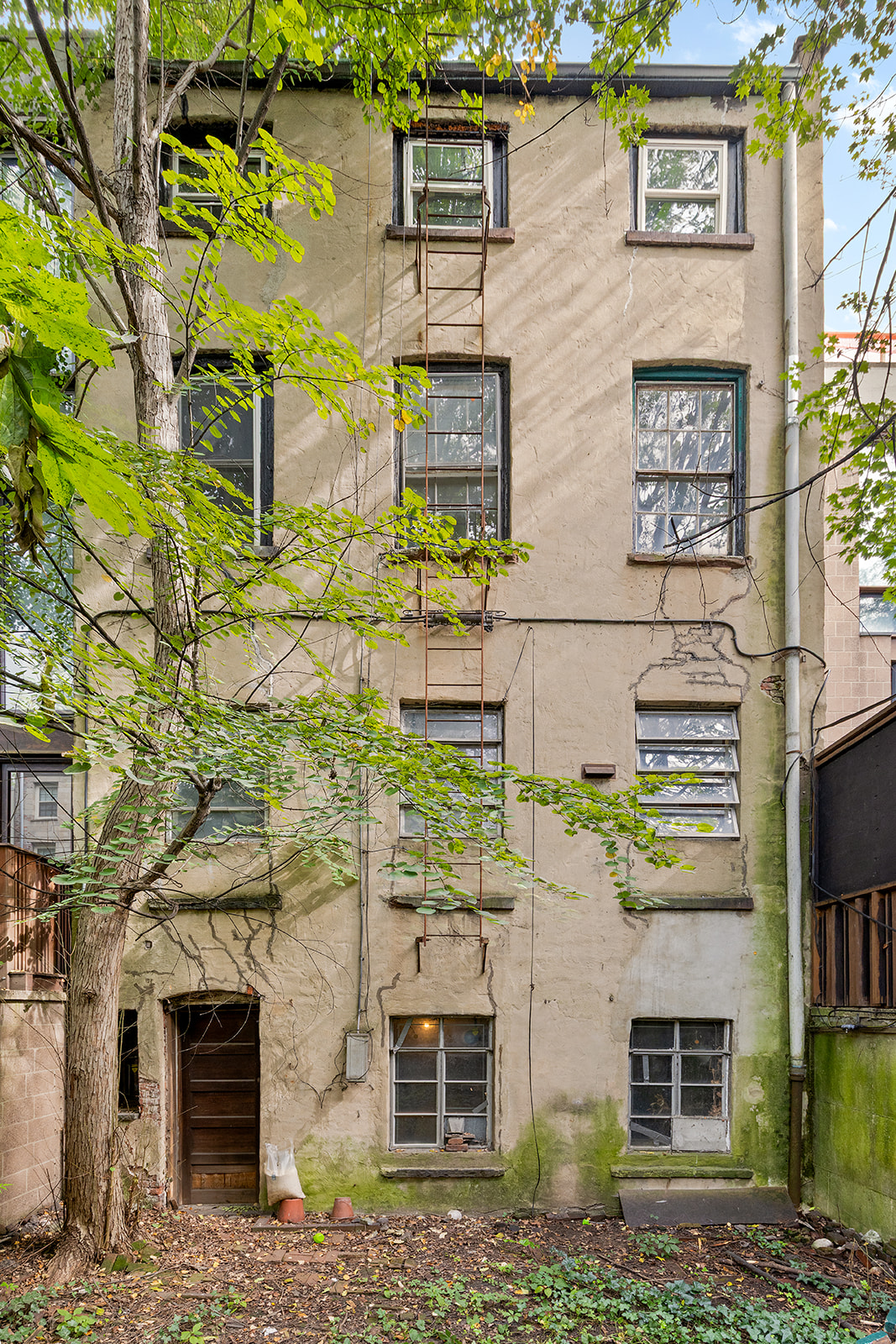 46 Willow Place Brooklyn, NY 11201 - Photo 24 of 31 a view of a brick house with many windows