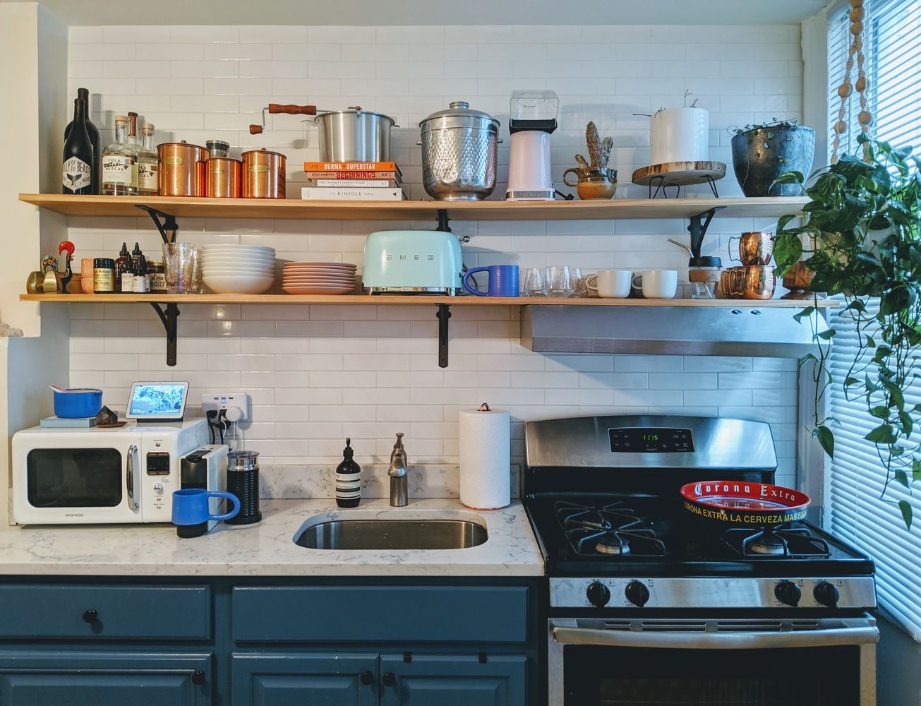 283 Devoe Street, Unit 2RR Brooklyn, NY 11211 - Photo 1 of 11 a kitchen with stainless steel appliances granite countertop a stove and a refrigerator