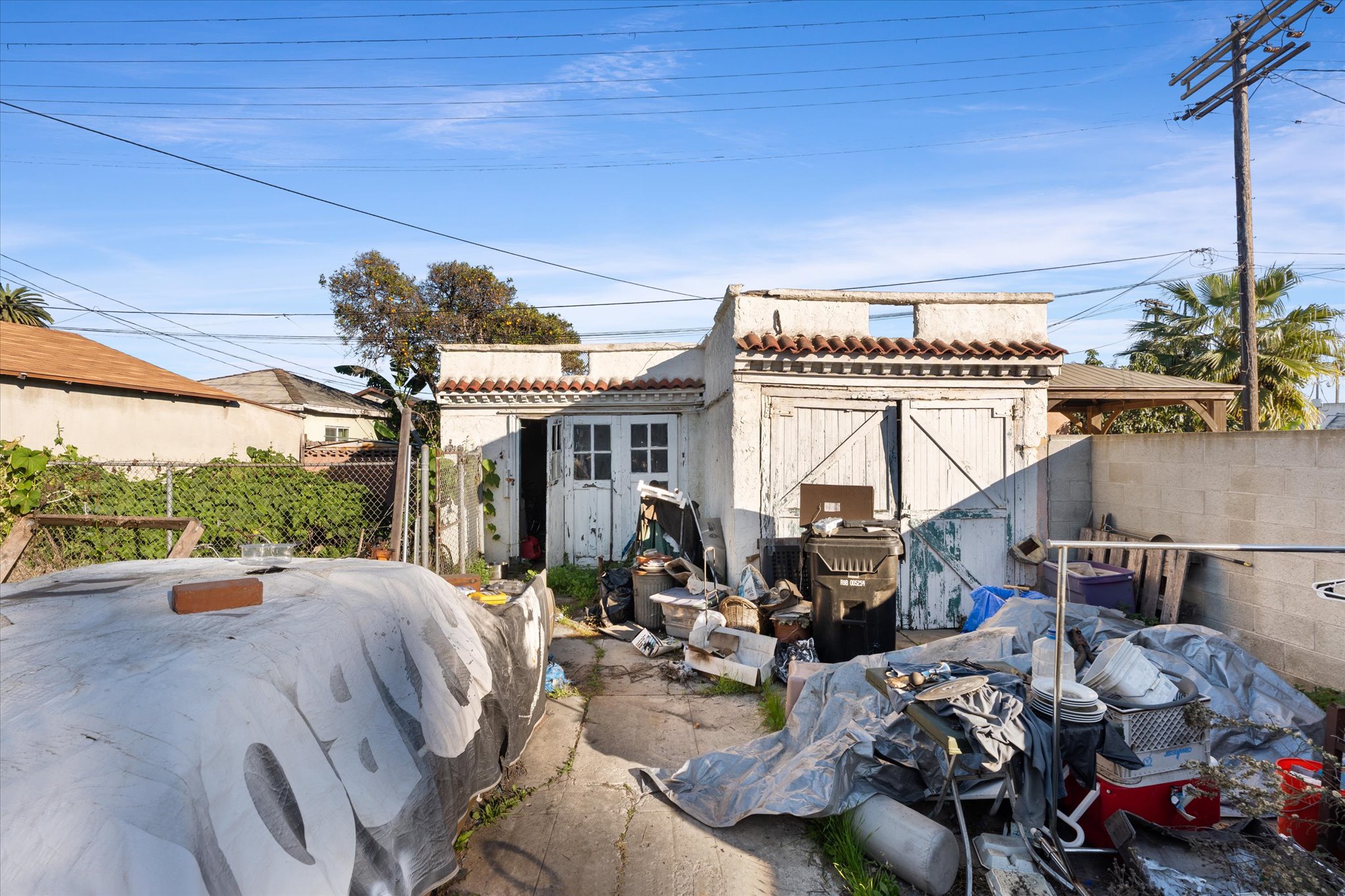 6326 5th Avenue Los Angeles, CA 90043 - Photo 9 of 14 a view of a patio with table and chairs and potted plants