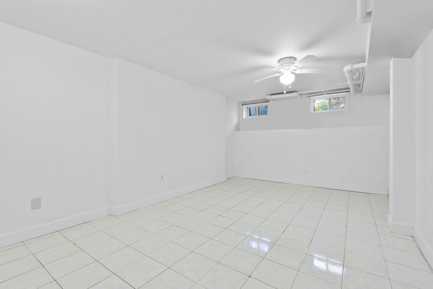 18-91 Stockholm Street, Unit 1 Queens, NY 11385 - Photo 3 of 5 an empty room with a empty space