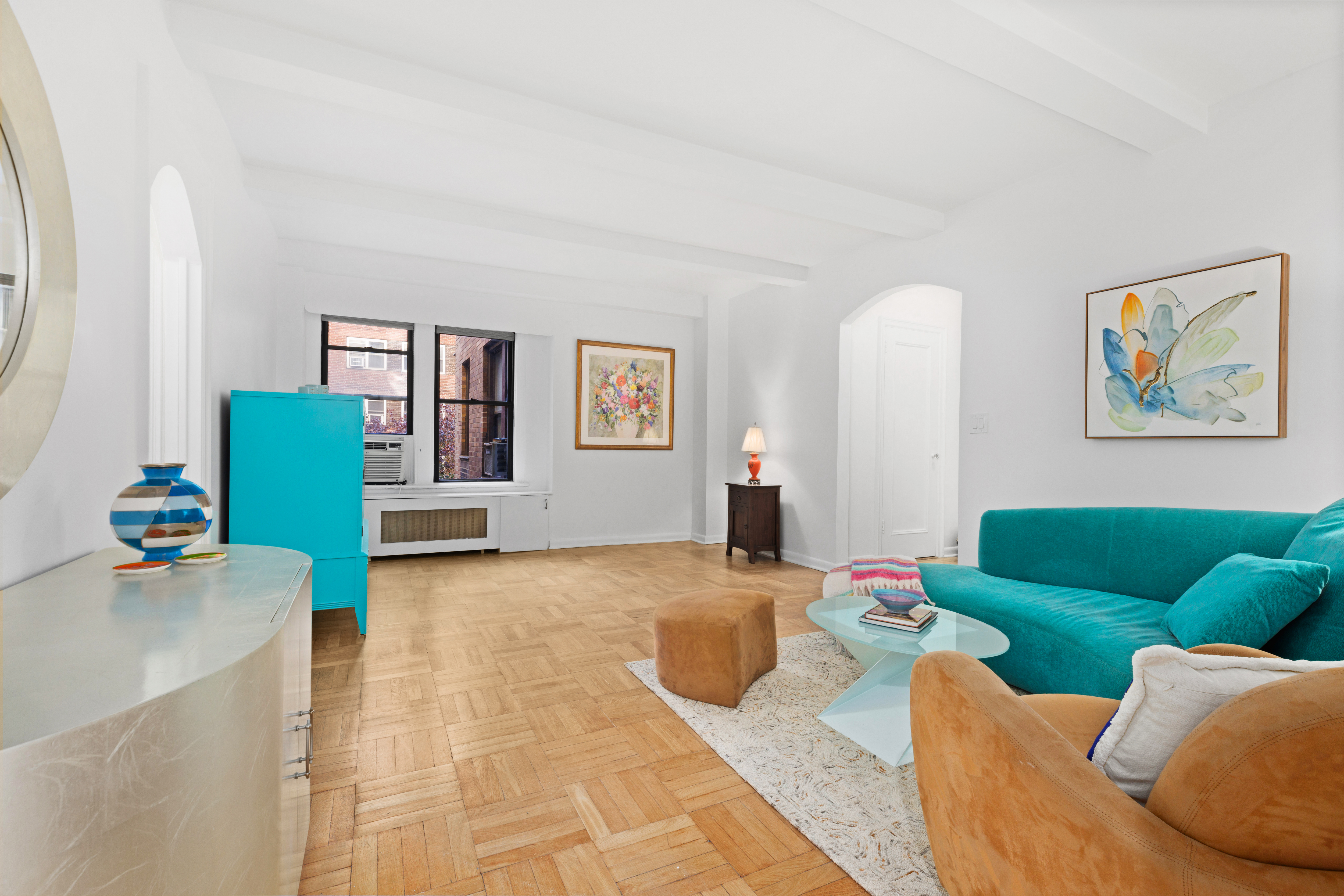 175 West 93rd Street, Unit 3D Manhattan, NY 10025 - Photo 2 of 10 a living room with furniture and a couch