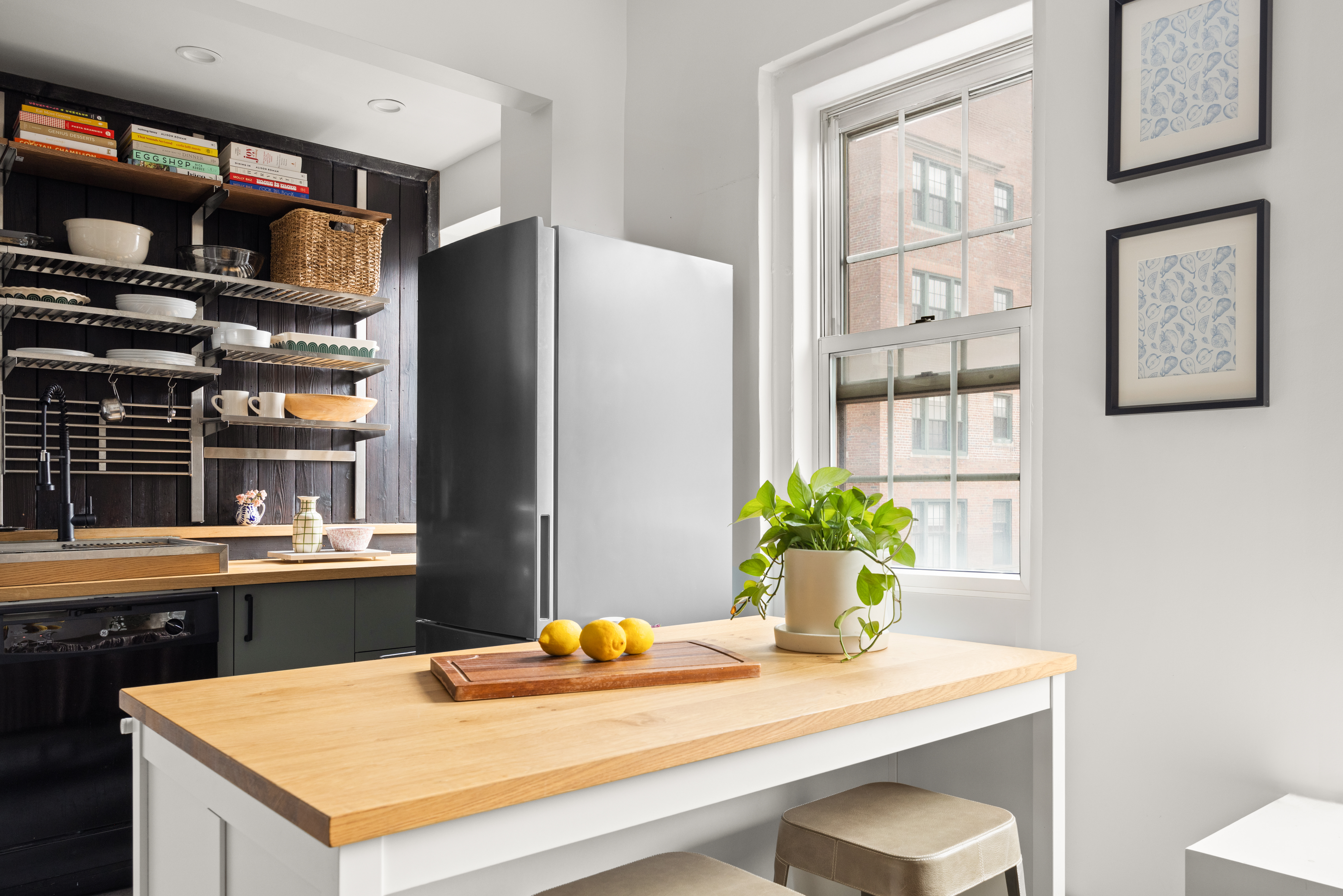 155 Henry Street, Unit 4H Brooklyn, NY 11201 - Photo 2 of 8 a view of a dining room with furniture and window