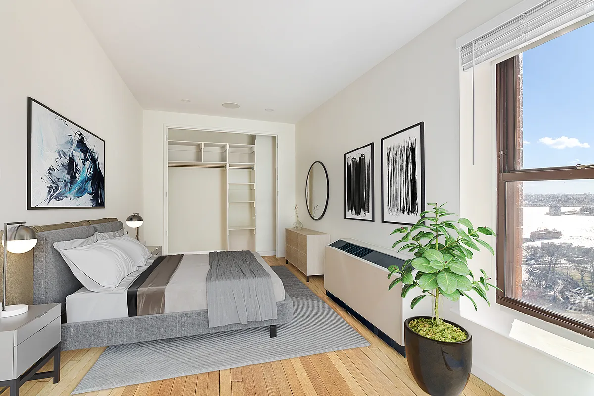 20 West Street, Unit 28F Manhattan, NY 10004 - Photo 5 of 18 a living room with furniture and a potted plant