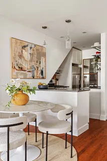 a workspace with furniture and window