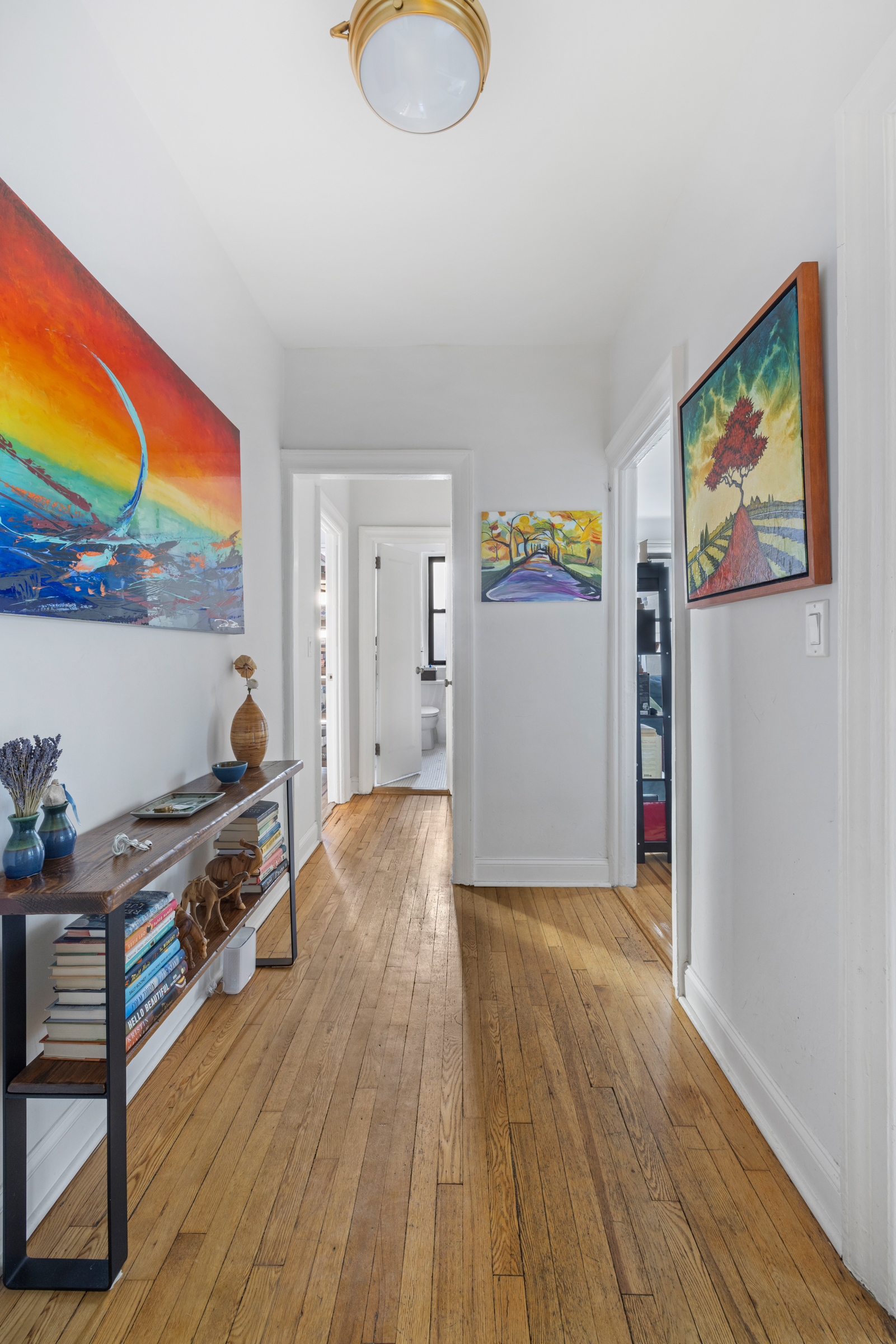 333 4th Street, Unit 2D Brooklyn, NY 11215 - Photo 3 of 7 a living room with stainless steel appliances furniture a rug and a window