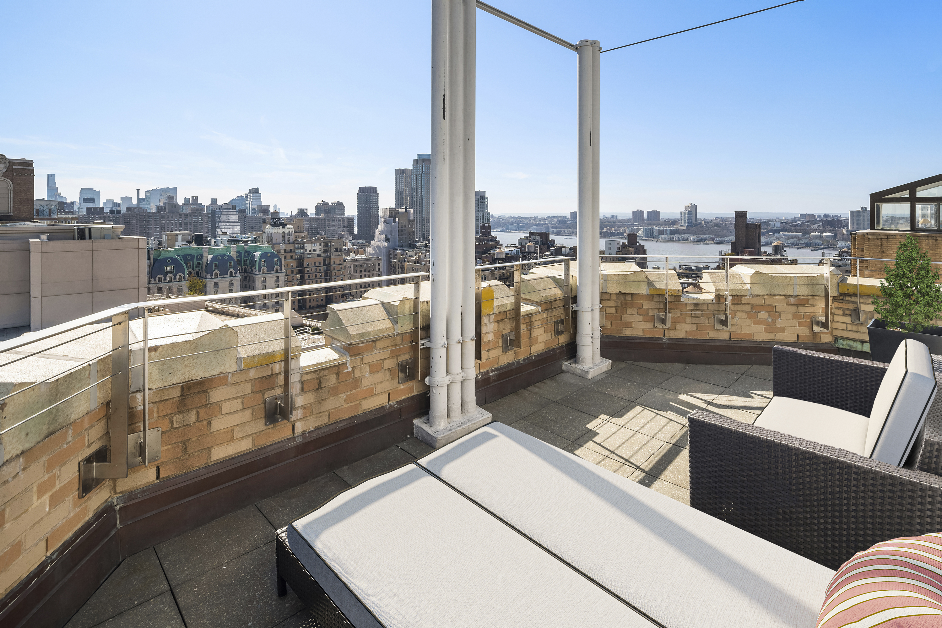 2166 Broadway, Unit PH Manhattan, NY 10024 - Photo 21 of 37 a view of a balcony with two chairs