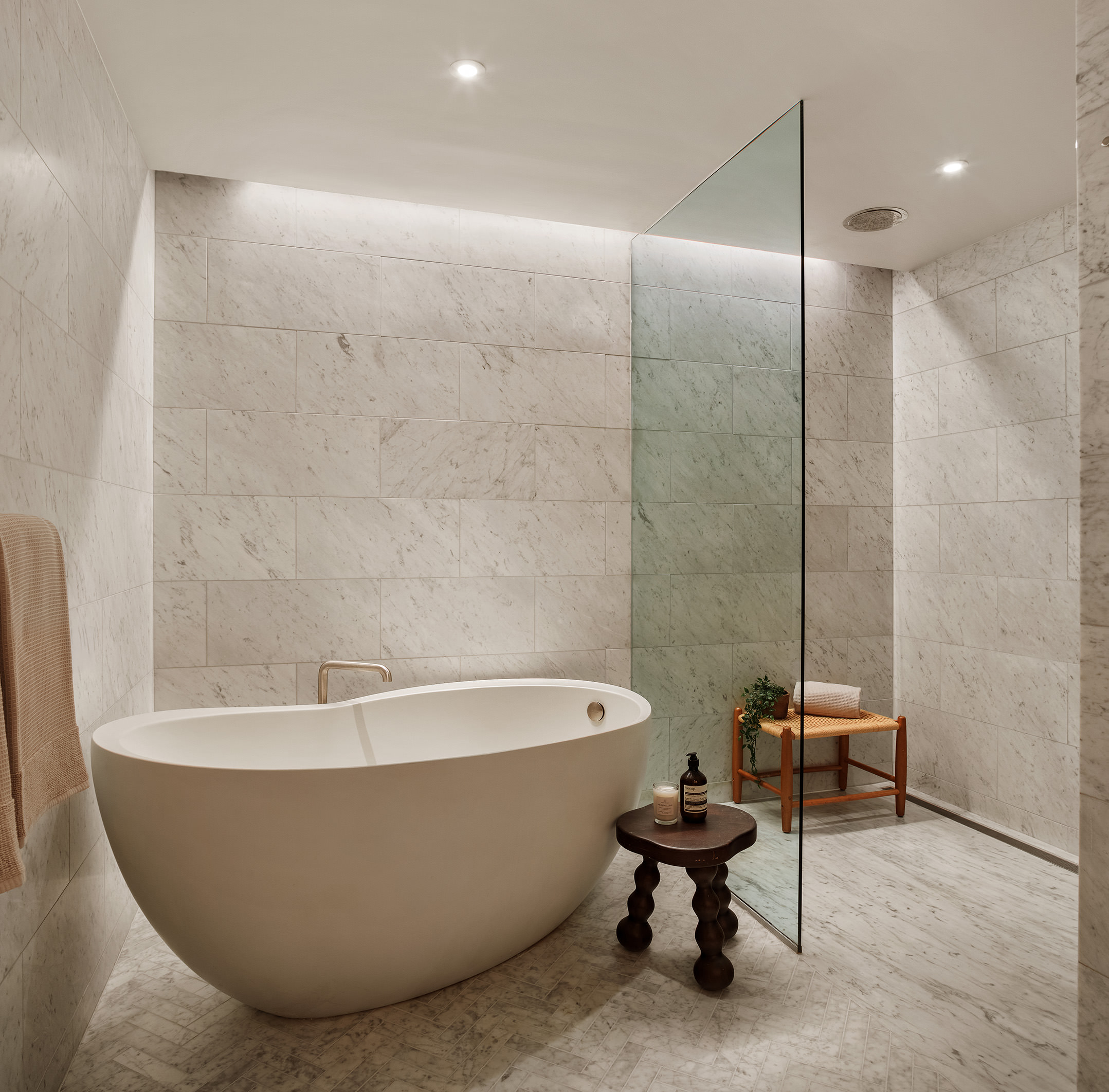 90 Furman Street, Unit N411 Brooklyn, NY 11201 - Photo 12 of 29 a white bath tub sitting next to a toilet