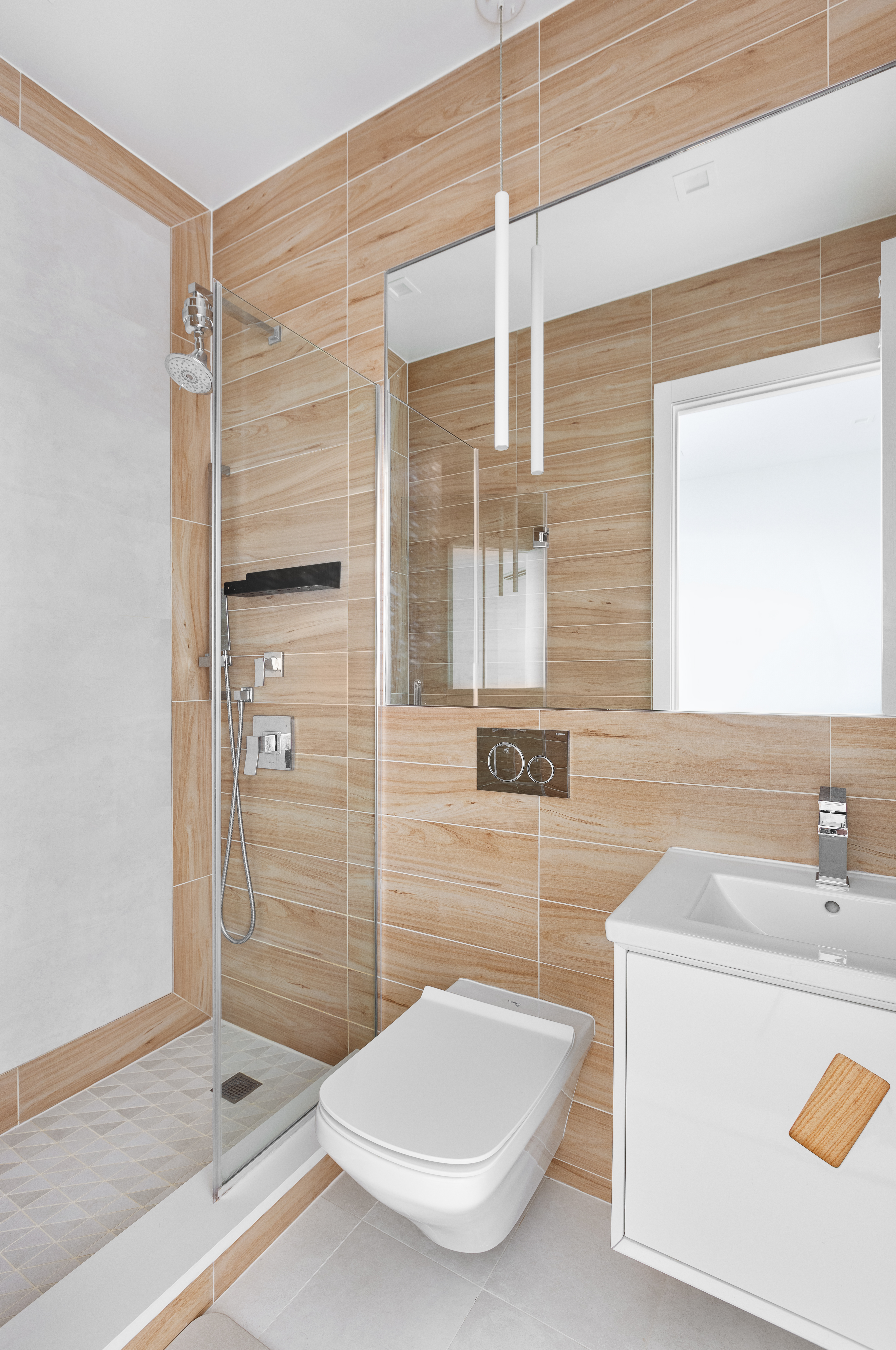 1122 Lafayette Avenue, Unit 4C Brooklyn, NY 11221 - Photo 8 of 14 a bathroom with a sink a toilet and shower