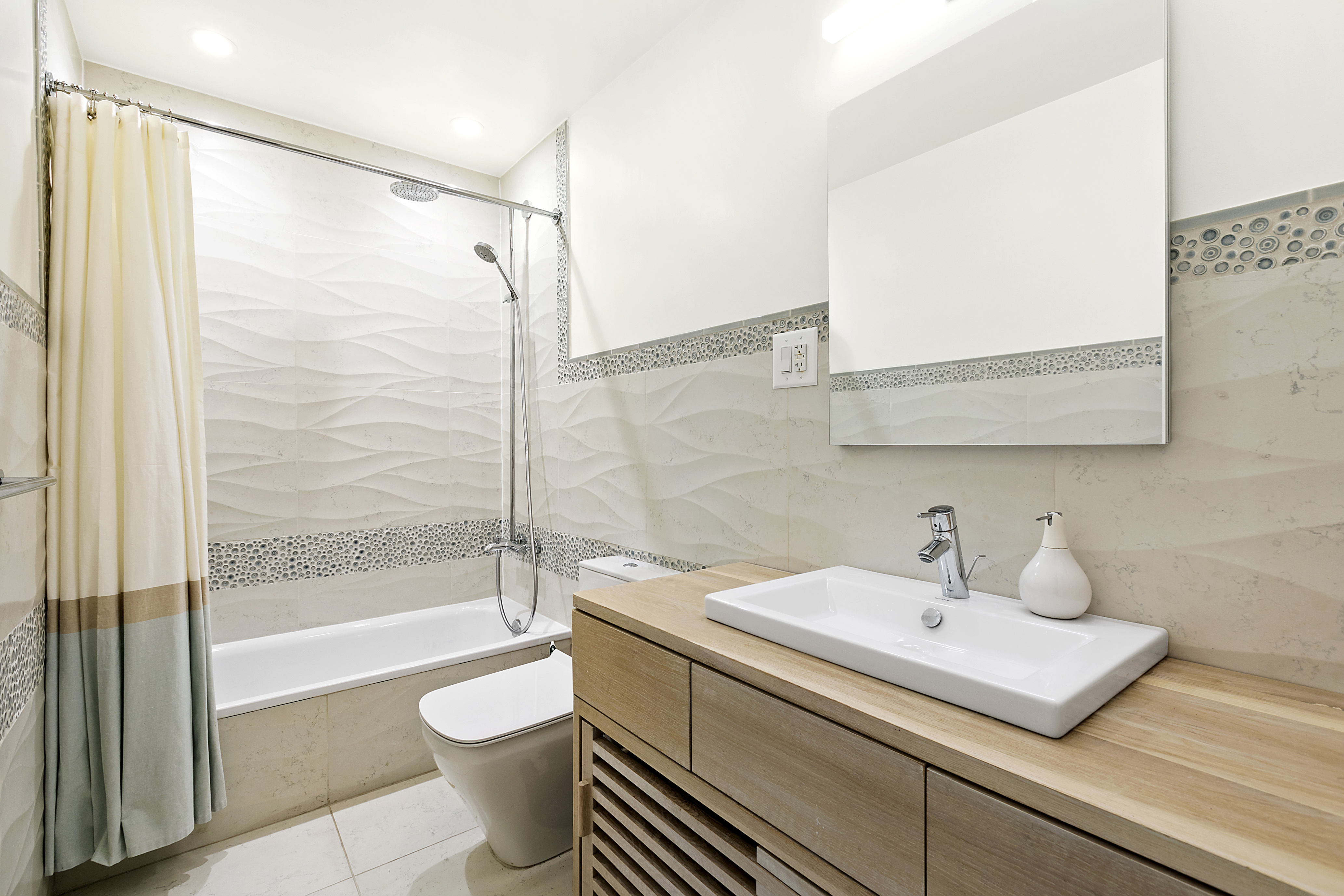 86 Butler Street, Unit 2 Brooklyn, NY 11231 - Photo 4 of 9 a bathroom with a sink toilet and shower