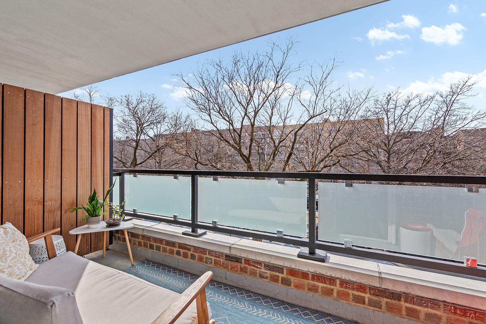 525 Ocean Parkway, Unit 2B Brooklyn, NY 11218 - Photo 11 of 12 a living room with a couch and a table