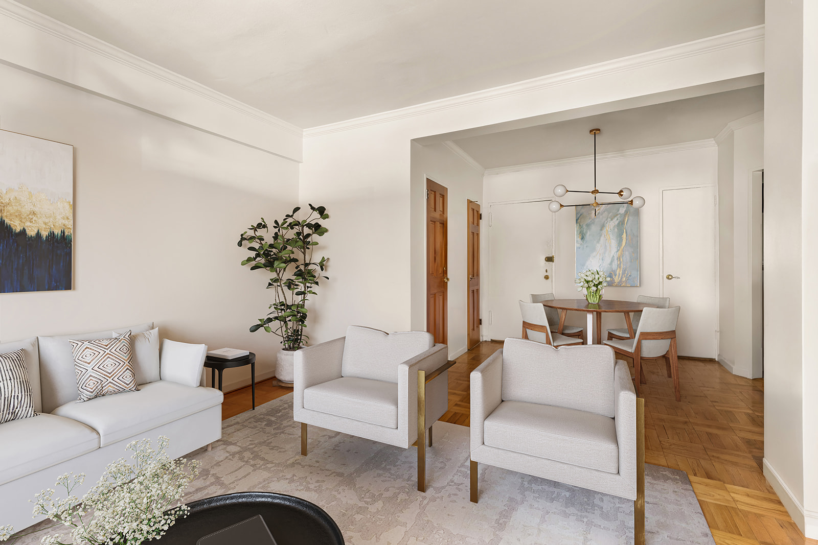 240 East 46th Street, Unit 7G Manhattan, NY 10017 - Photo 5 of 14 a living room with furniture and a chandelier