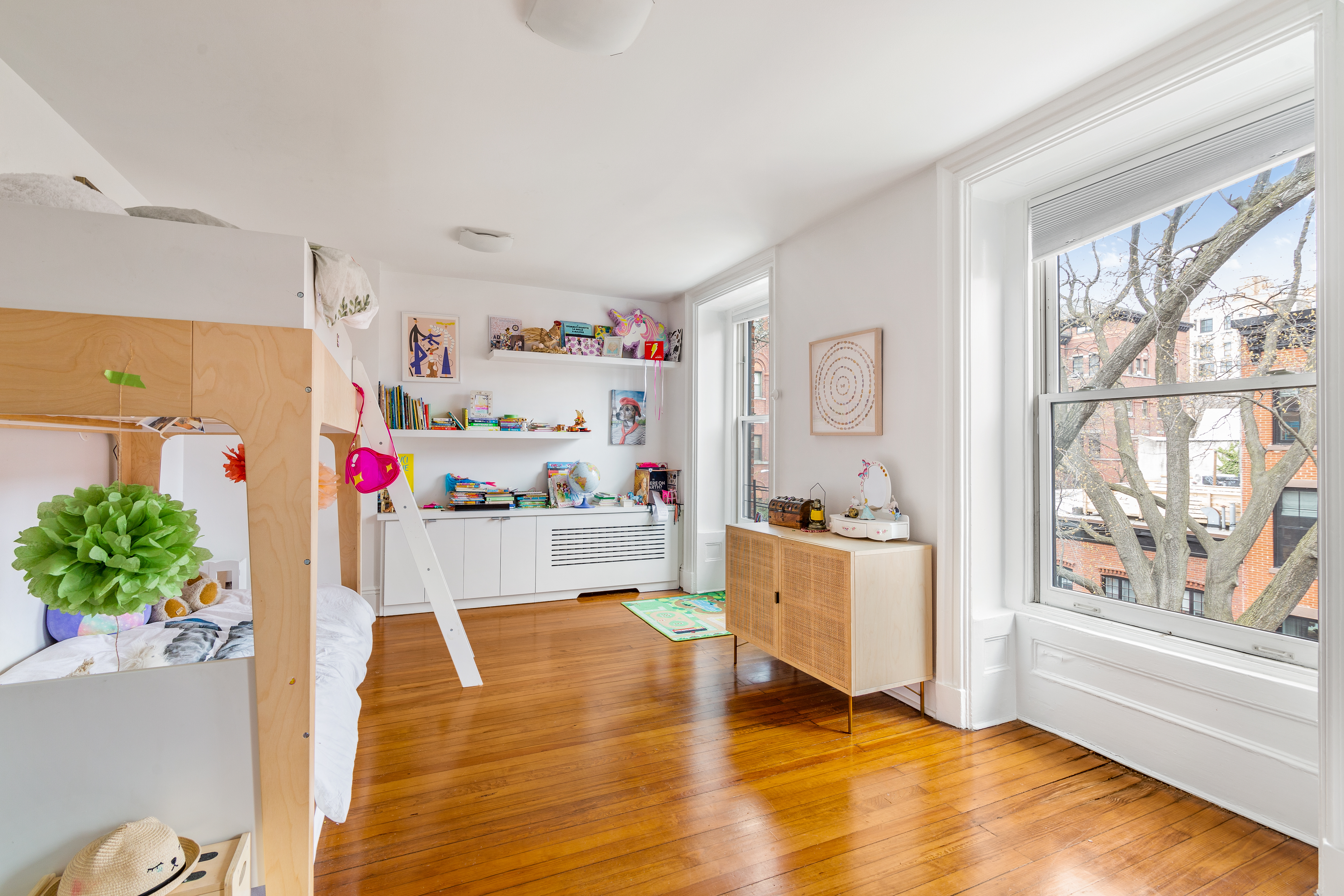 176 Warren Street Brooklyn, NY 11201 - Photo 8 of 13 a living room with furniture and a large window