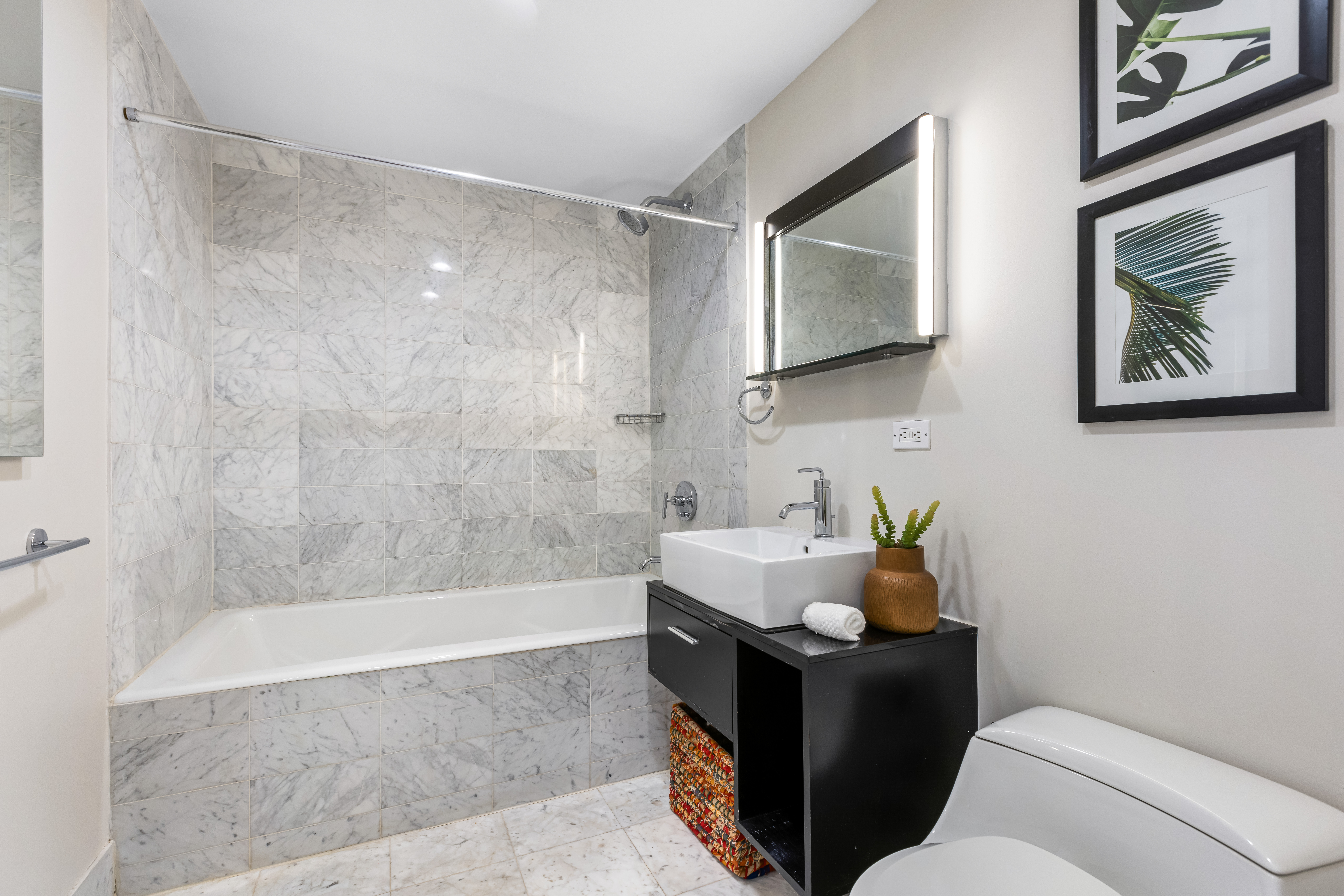 257 West 117th Street, Unit 6A Manhattan, NY 10026 - Photo 12 of 16 a living room with furniture and a painting on the wall