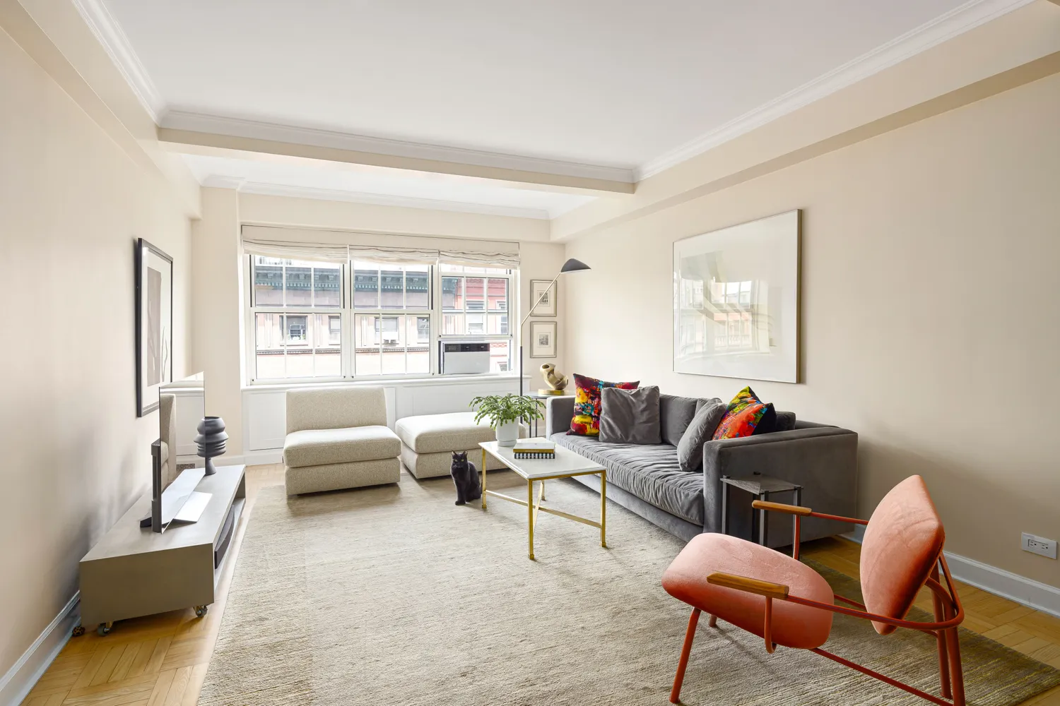 a living room with furniture and a window