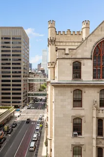 a front view of a building with lot of windows