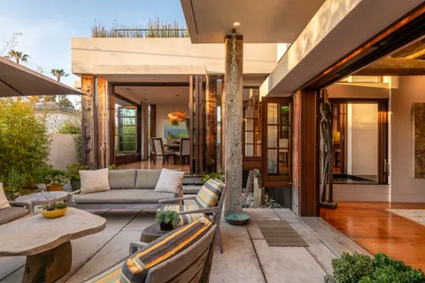 a spacious bathroom with a granite countertop tub sink and mirror