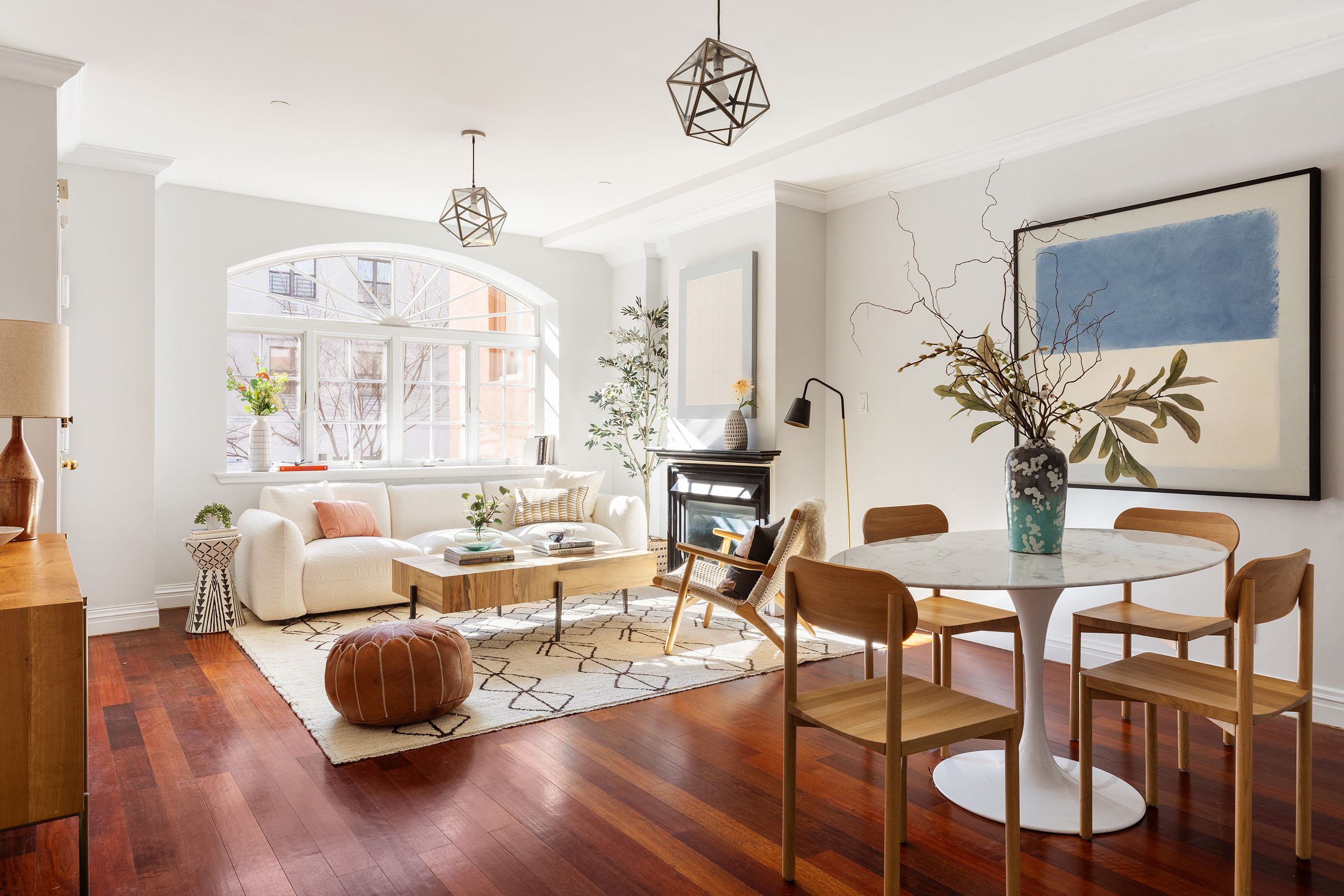 301 Warren Street, Unit 2 Brooklyn, NY 11201 - Photo 3 of 11 a living room with furniture dining table and a chandelier