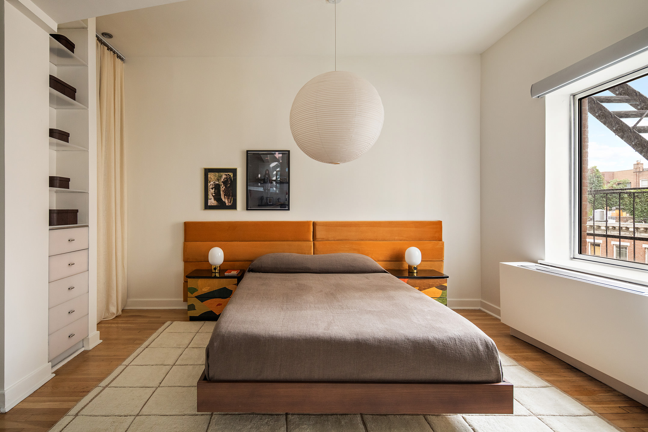 204 West Houston Street, Unit 4B Manhattan, NY 10014 - Photo 6 of 10 a bedroom with a bed and a window