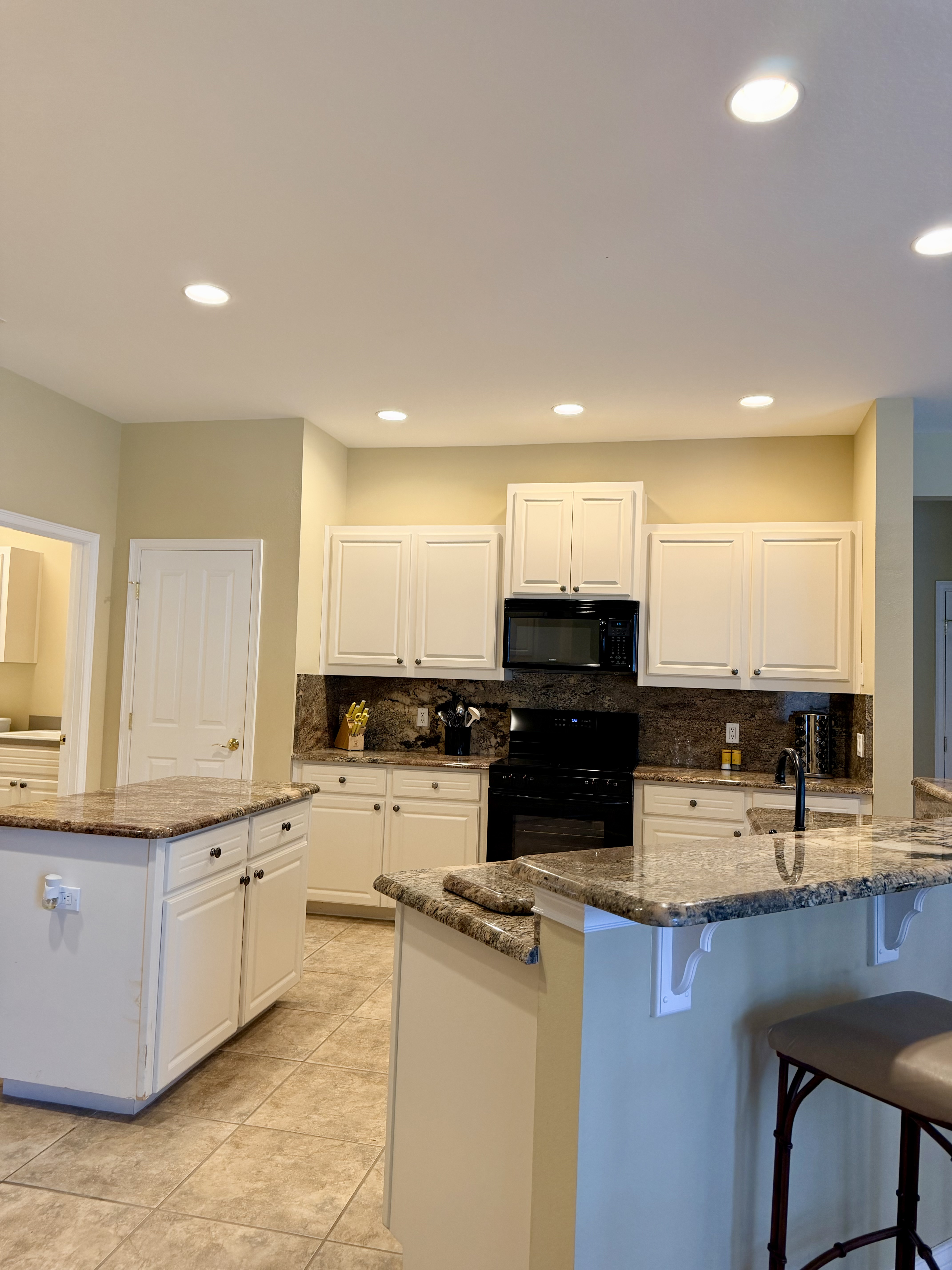 3196 Hawks Ridge Drive Lakeland, FL 33810 - Photo 7 of 14 a kitchen with a sink cabinets and window
