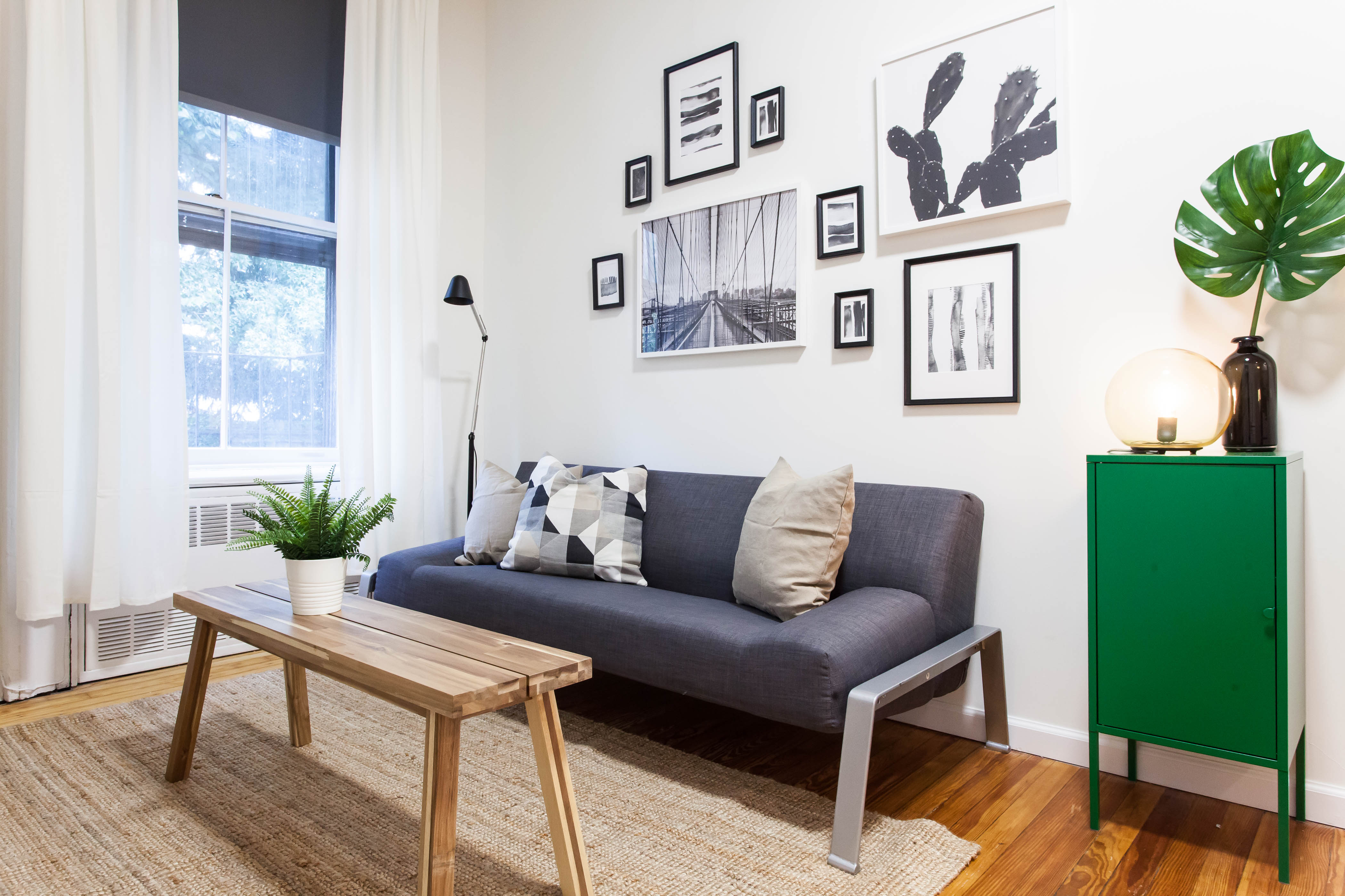 103 Atlantic Avenue, Unit 4R Brooklyn, NY 11201 - Photo 1 of 7 a living room with furniture and a potted plant