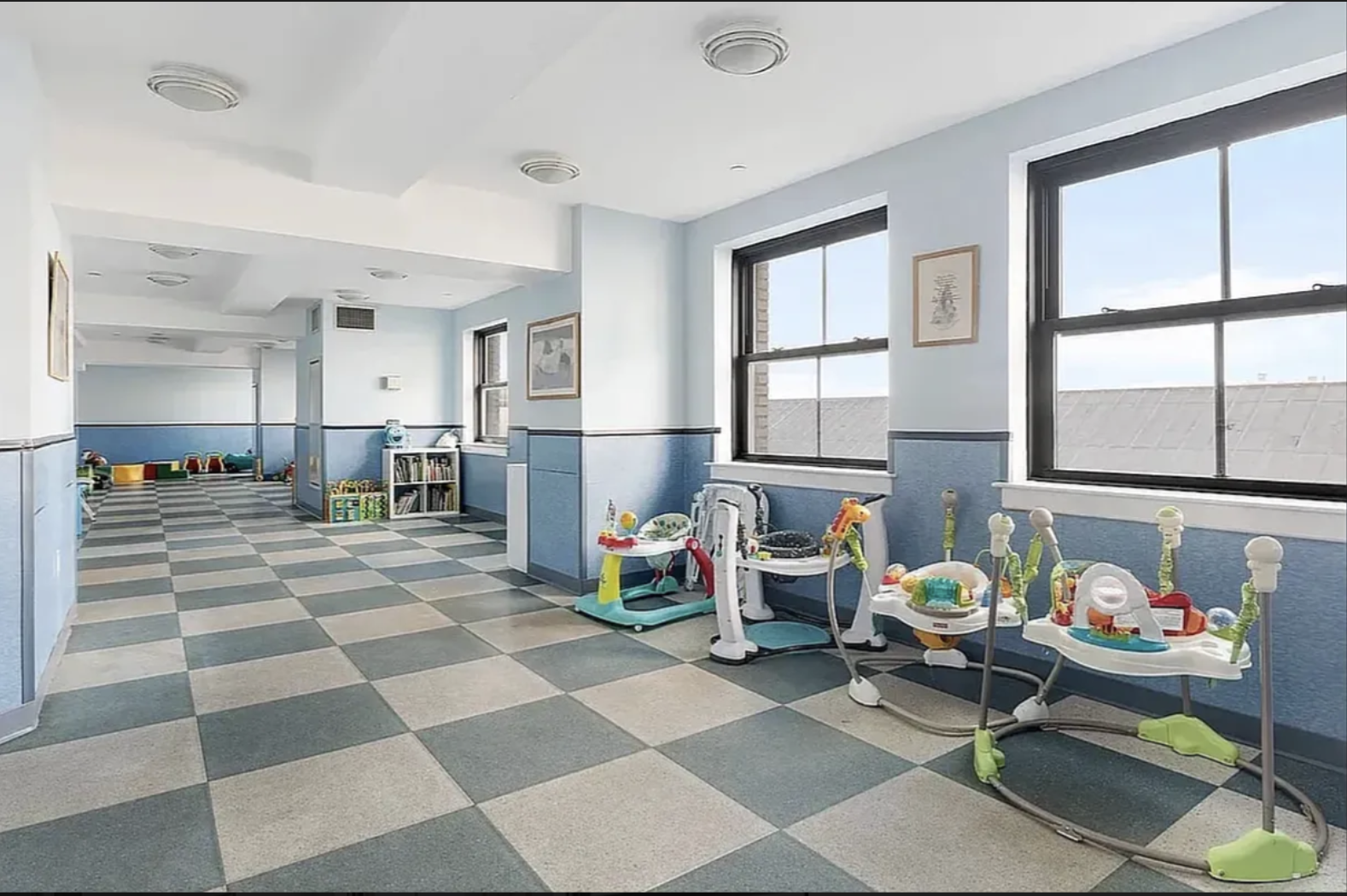 1 Hanson Place, Unit 25C Brooklyn, NY 11243 - Photo 12 of 18 a living room with furniture and a dining table with kitchen view
