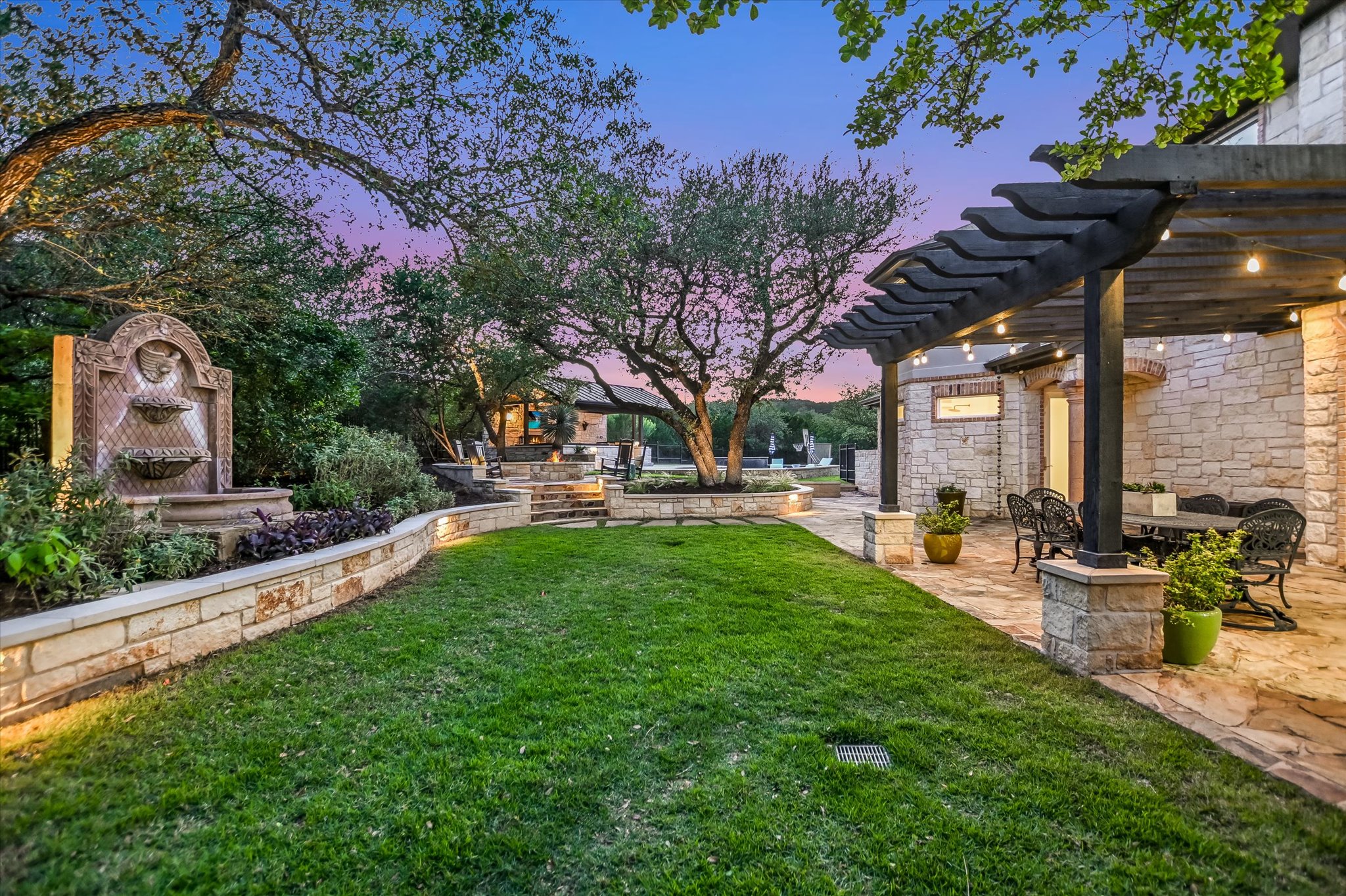 1422 Palomino Ridge Drive Austin, TX 78733 - Photo 42 of 60 a view of yard with swimming pool and sitting area