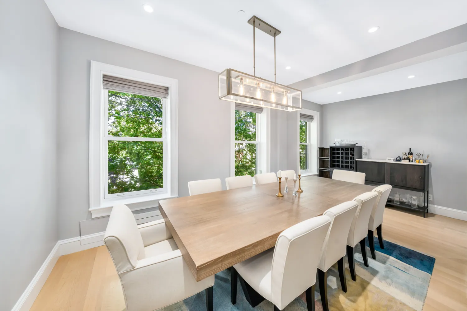 a view of a dining room with furniture window and outside view