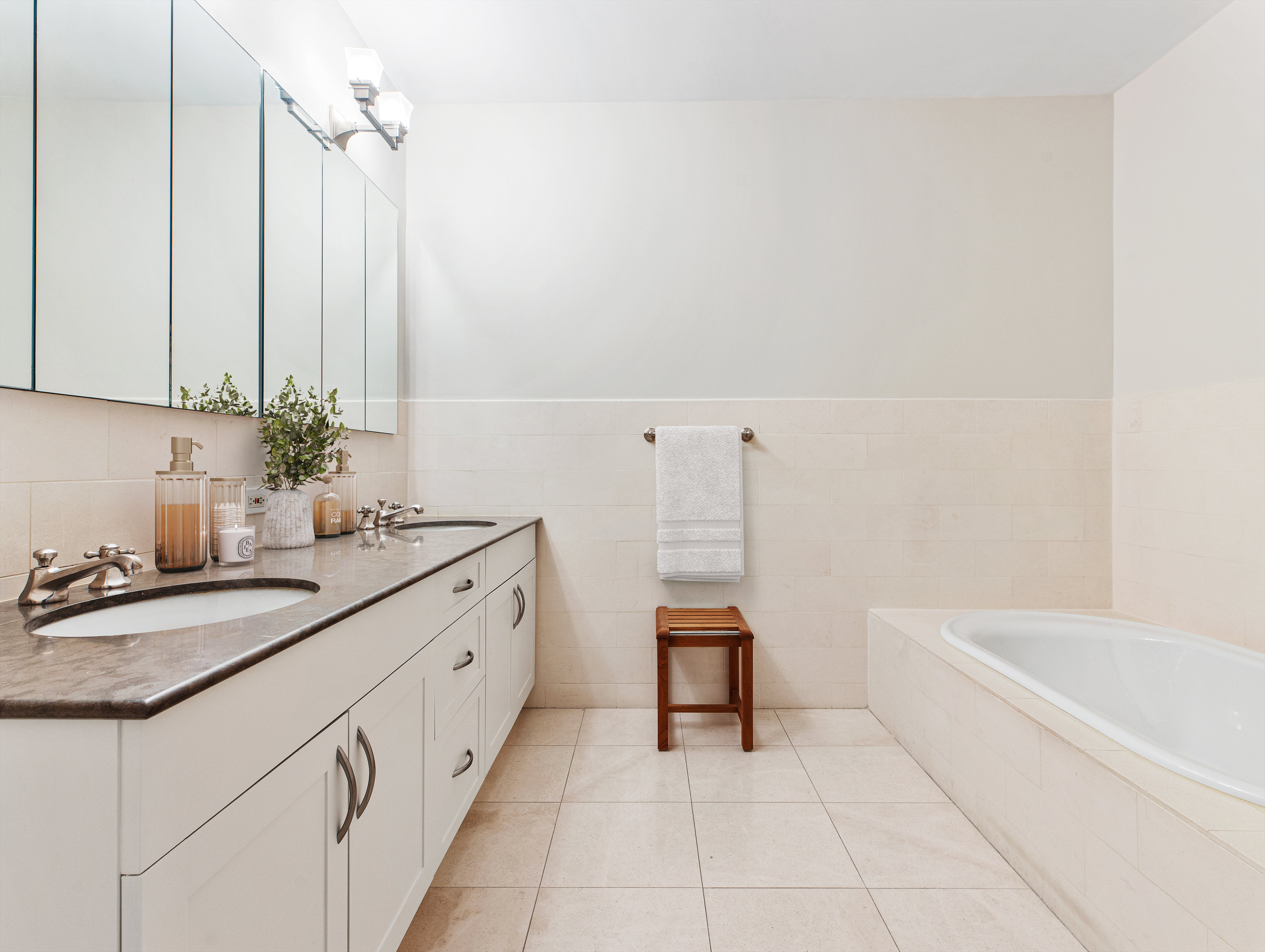 63 West 17th Street, Unit 5B Manhattan, NY 10011 - Photo 9 of 12 a bathroom with a sink and a bathtub