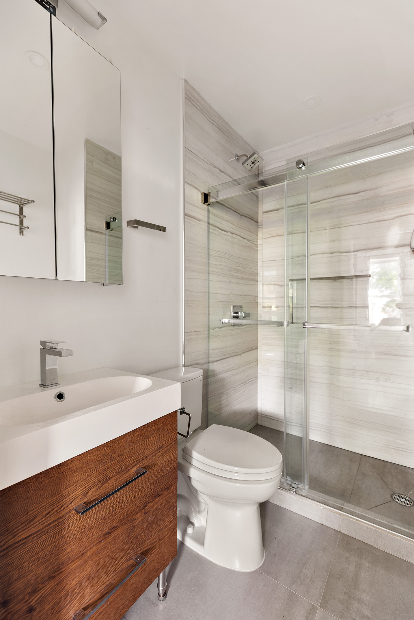 356 7th Avenue, Unit 2 Brooklyn, NY 11215 - Photo 4 of 7 a bathroom with a sink a toilet and shower