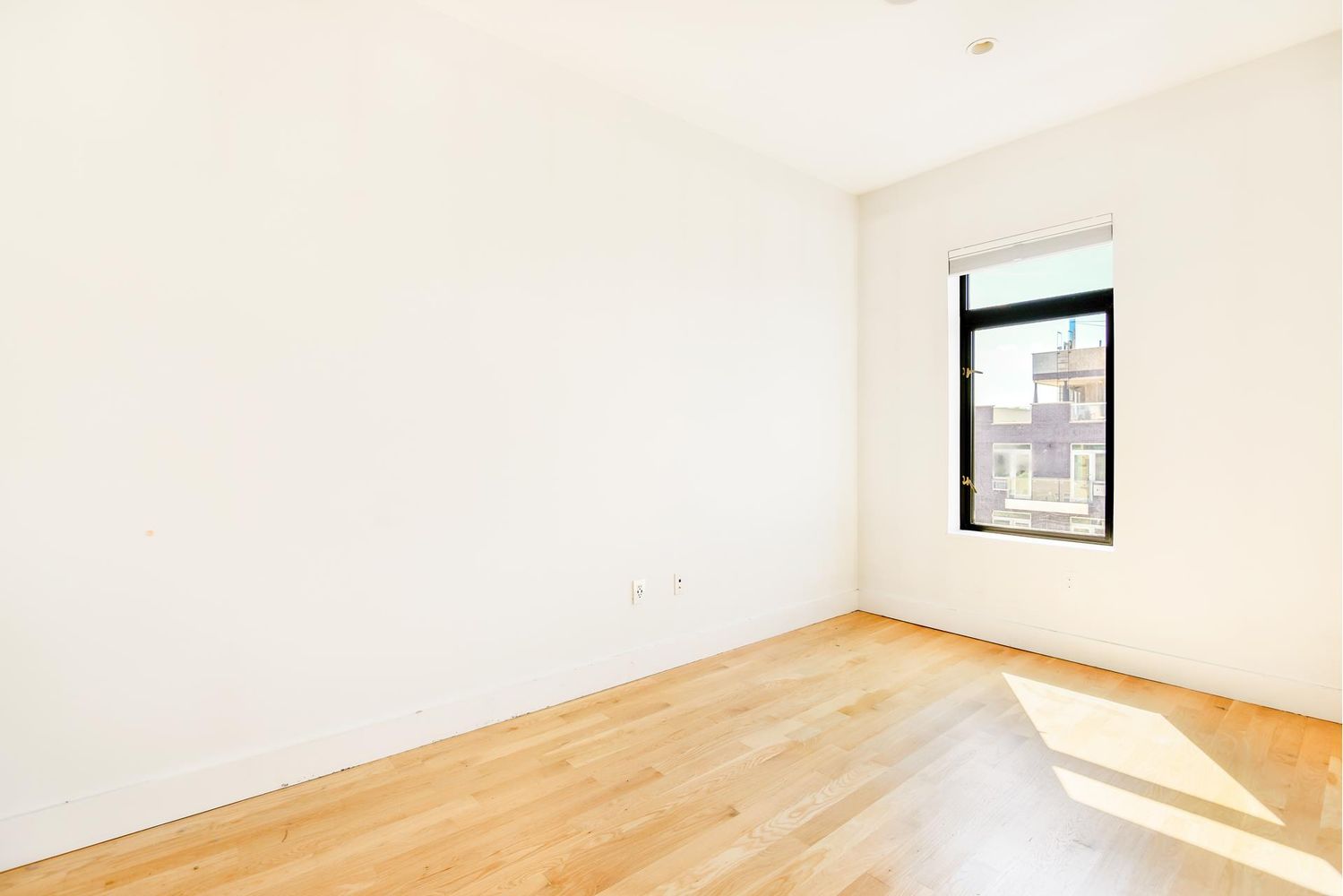 629 Grand Street, Unit 4A Brooklyn, NY 11211 - Photo 4 of 7 a view of an empty room