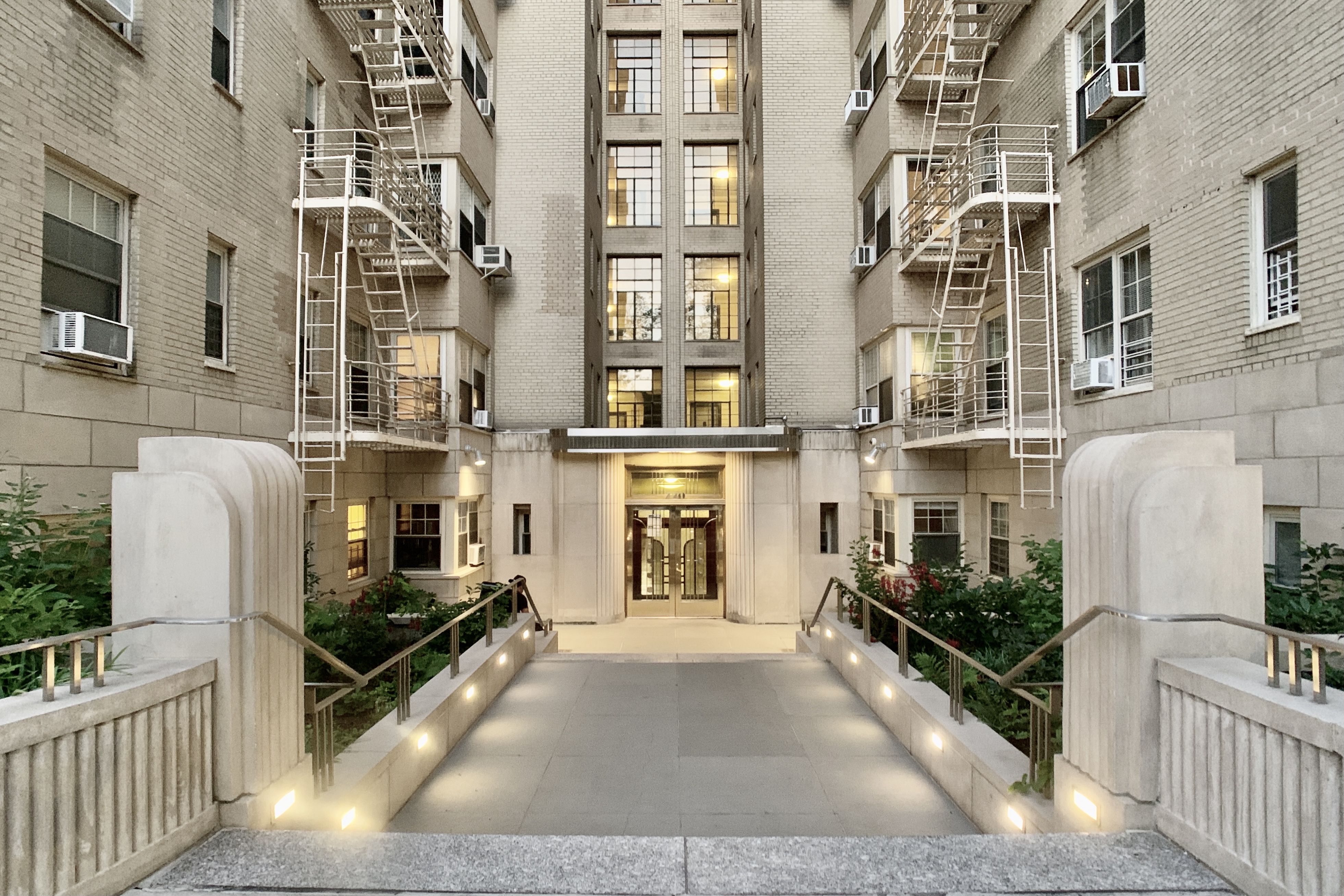 720 Fort Washington Avenue, Unit 6M Manhattan, NY 10040 - Photo 13 of 18 a view of a building with many windows