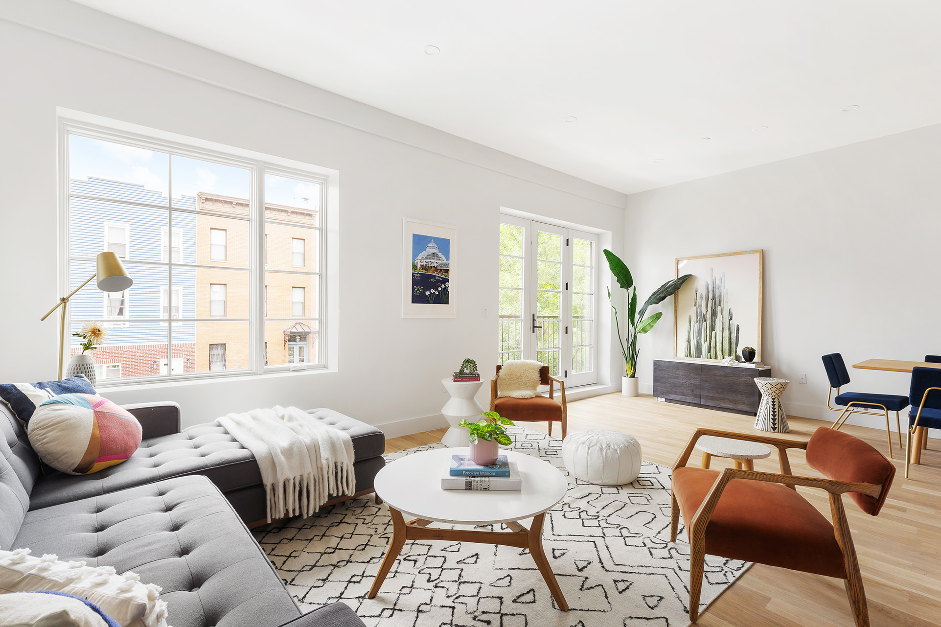 262 17th Street, Unit 2 Brooklyn, NY 11215 - Photo 1 of 11 a living room with furniture and a large window