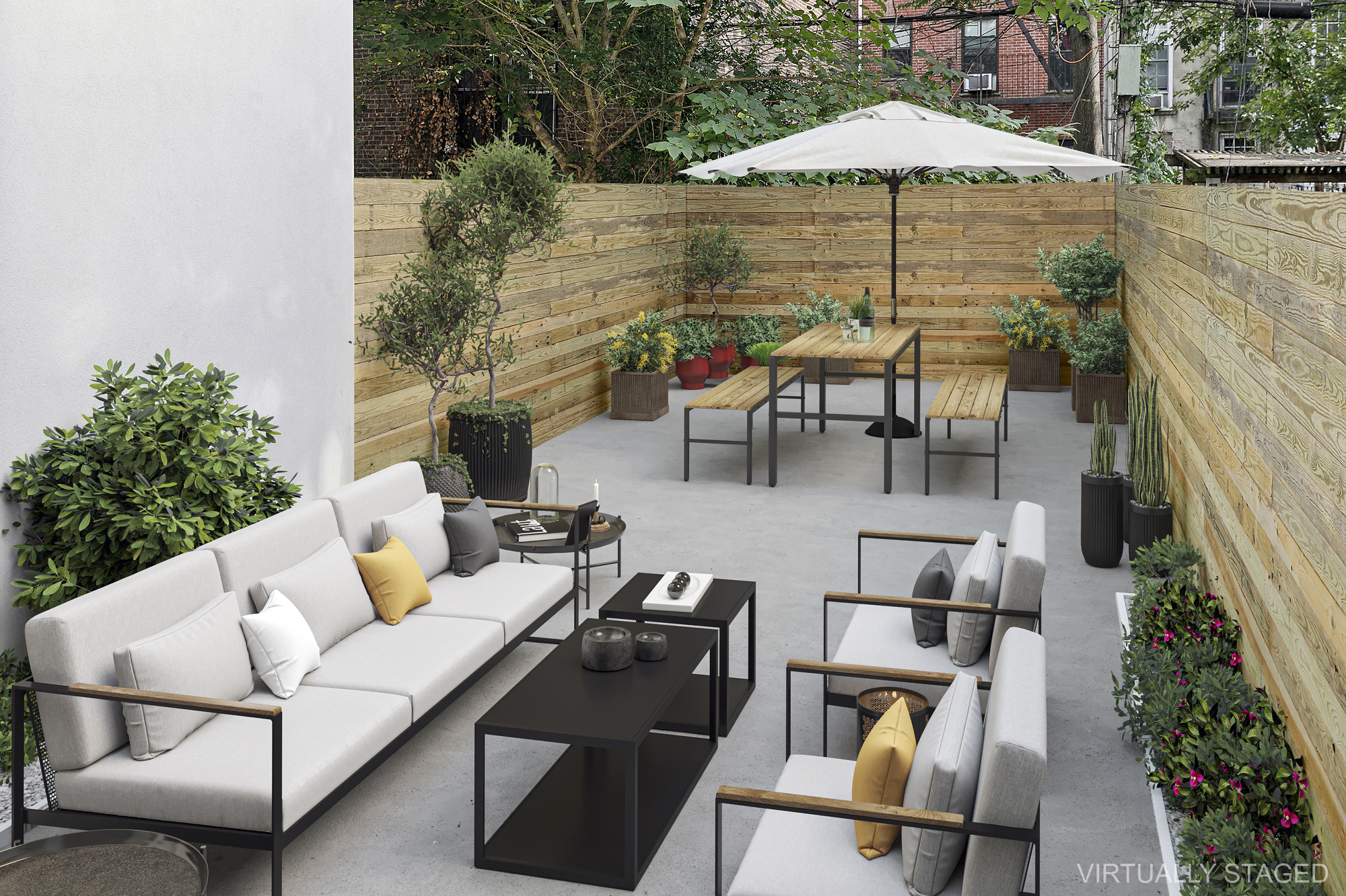 116 Madison Street Brooklyn, NY 11216 - Photo 14 of 20 an outdoor sitting area with furniture and umbrella