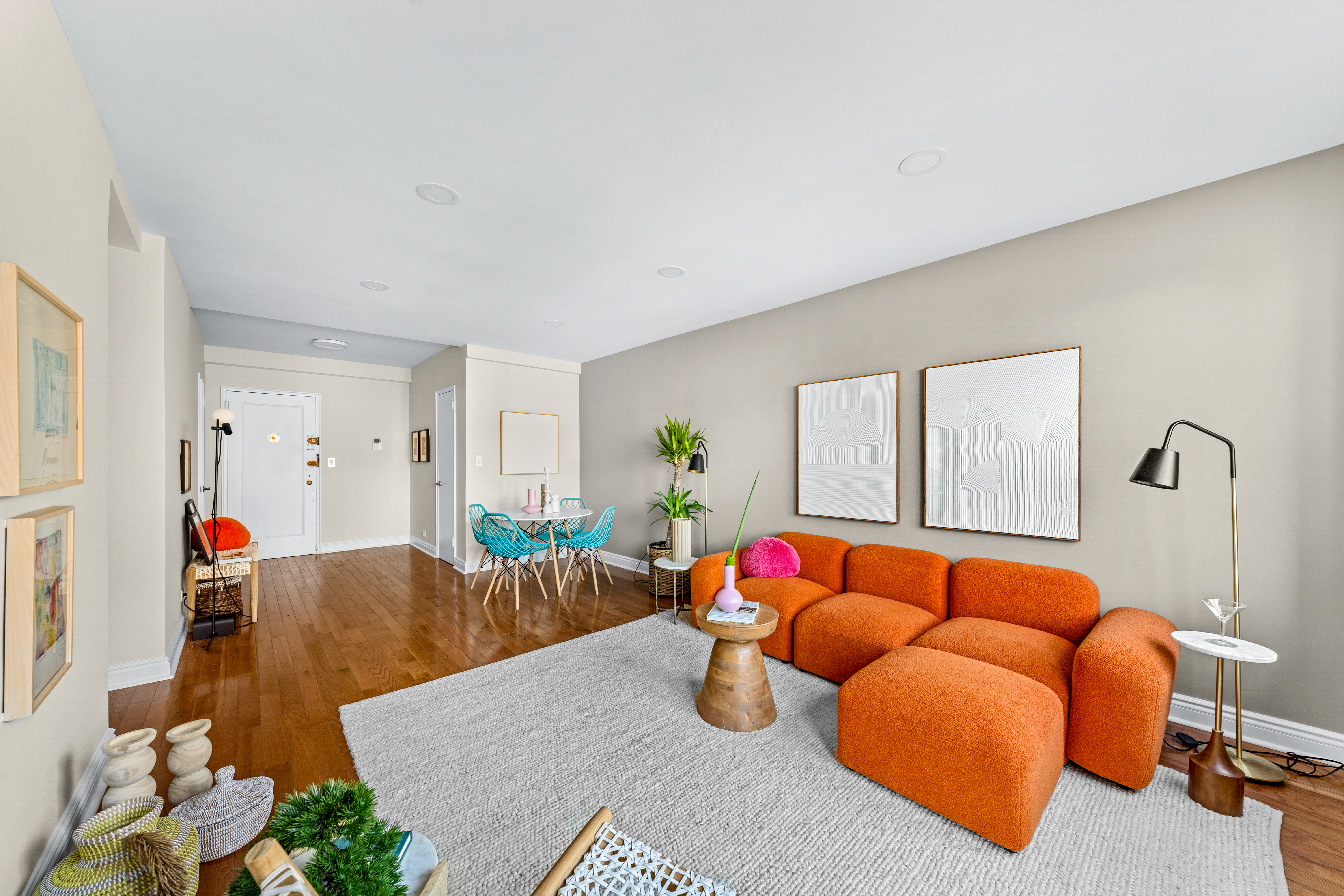 71-36 110th Street, Unit PH7E Queens, NY 11375 - Photo 4 of 16 a bedroom with furniture and a couch