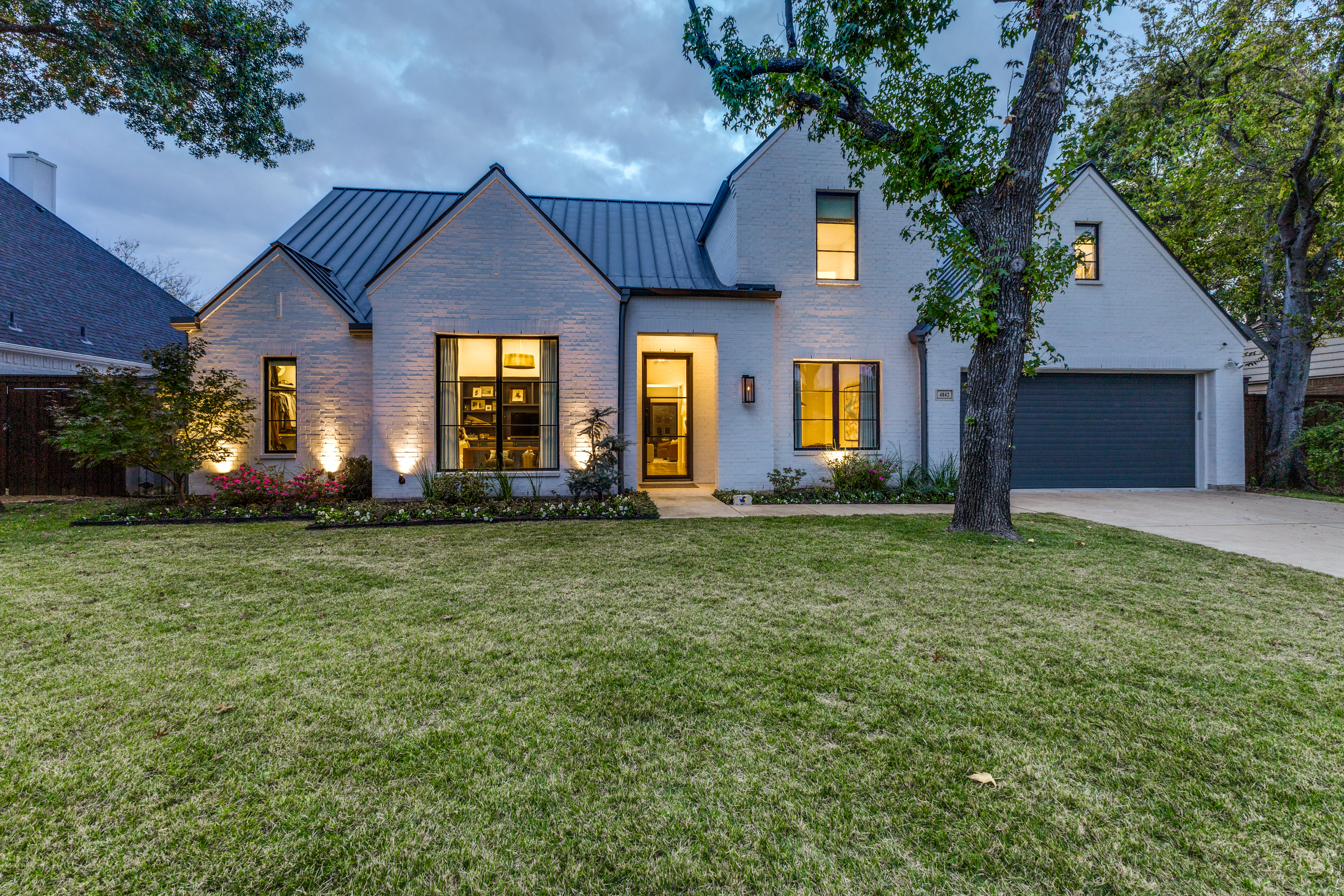 front view of a house with a yard