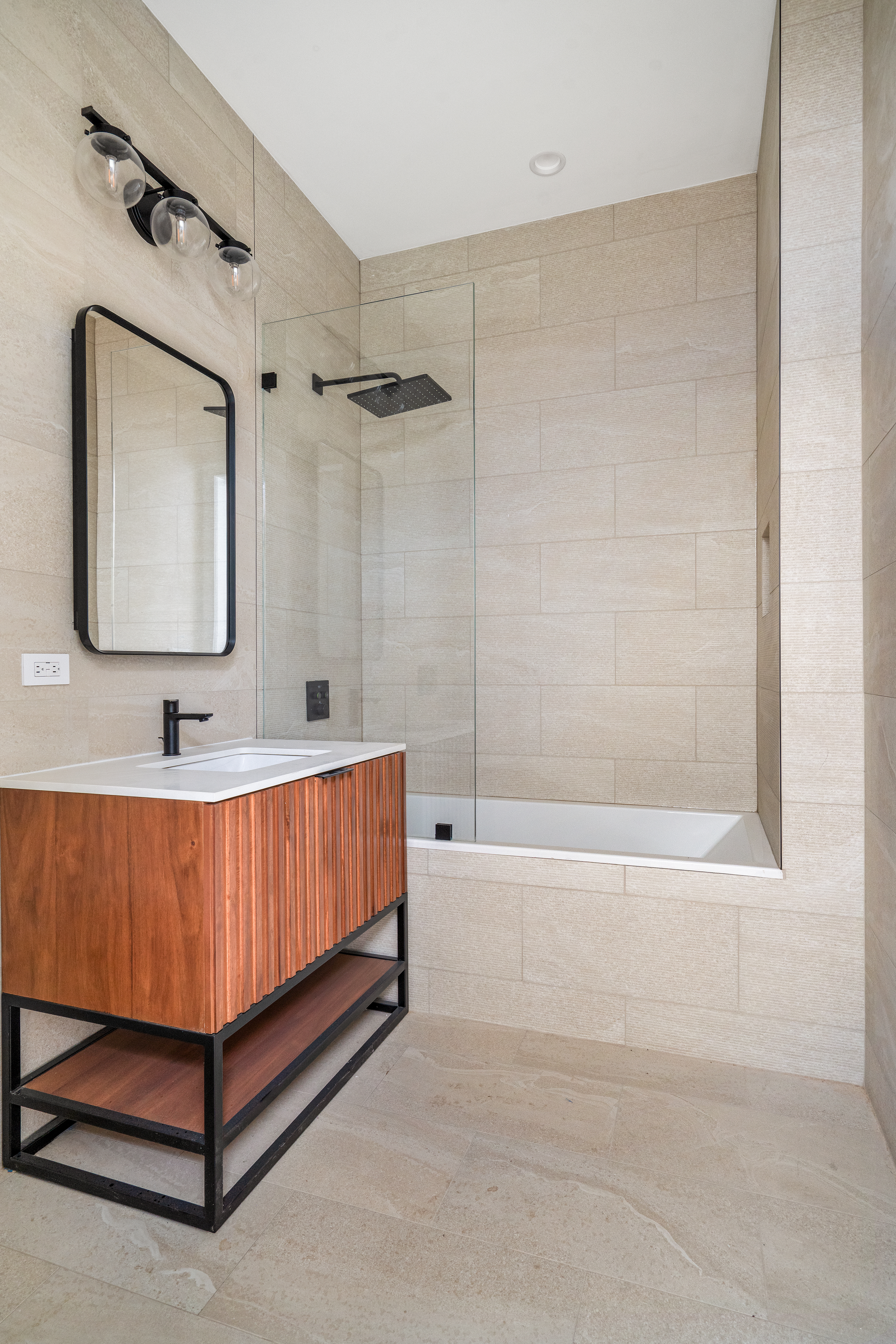 74 Carroll Street, Unit 2 Brooklyn, NY 11231 - Photo 9 of 13 a bathroom with a bathtub and shower